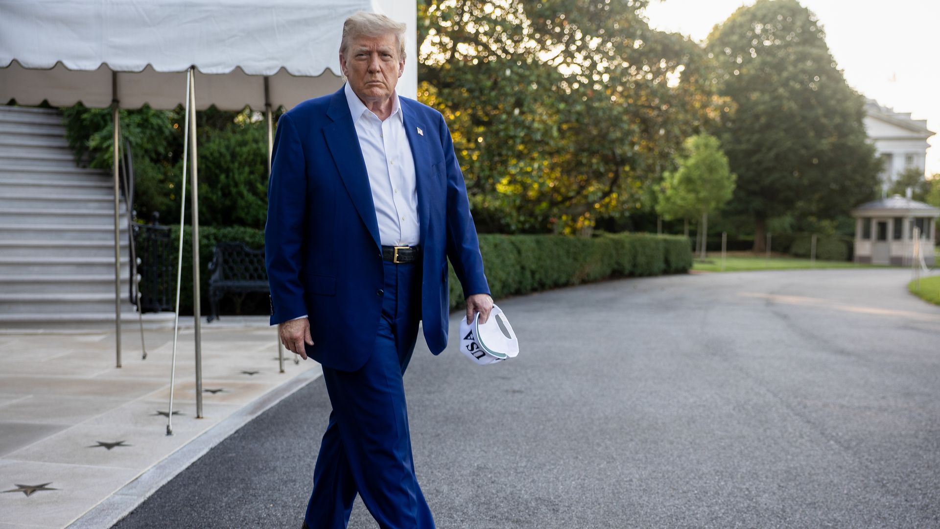 US President Donald Trump walks on the South Lawn of the White House before boarding Marine One in Washington, DC, US, on Tuesday, June 24, 2025. Trump called on Israel to stop dropping bombs on Iran, calling it a "major violation" of a fragile ceasefire between the two countries.