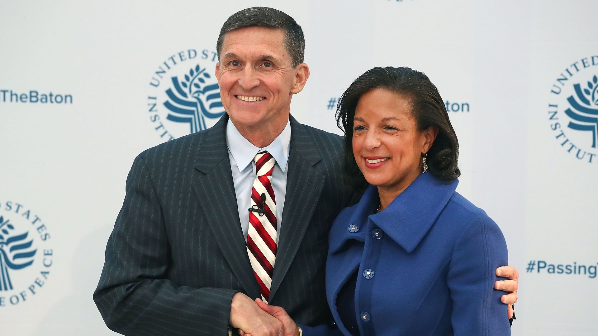 Former National Security Advisor Susan Rice poses with her replacement, Michael Flynn