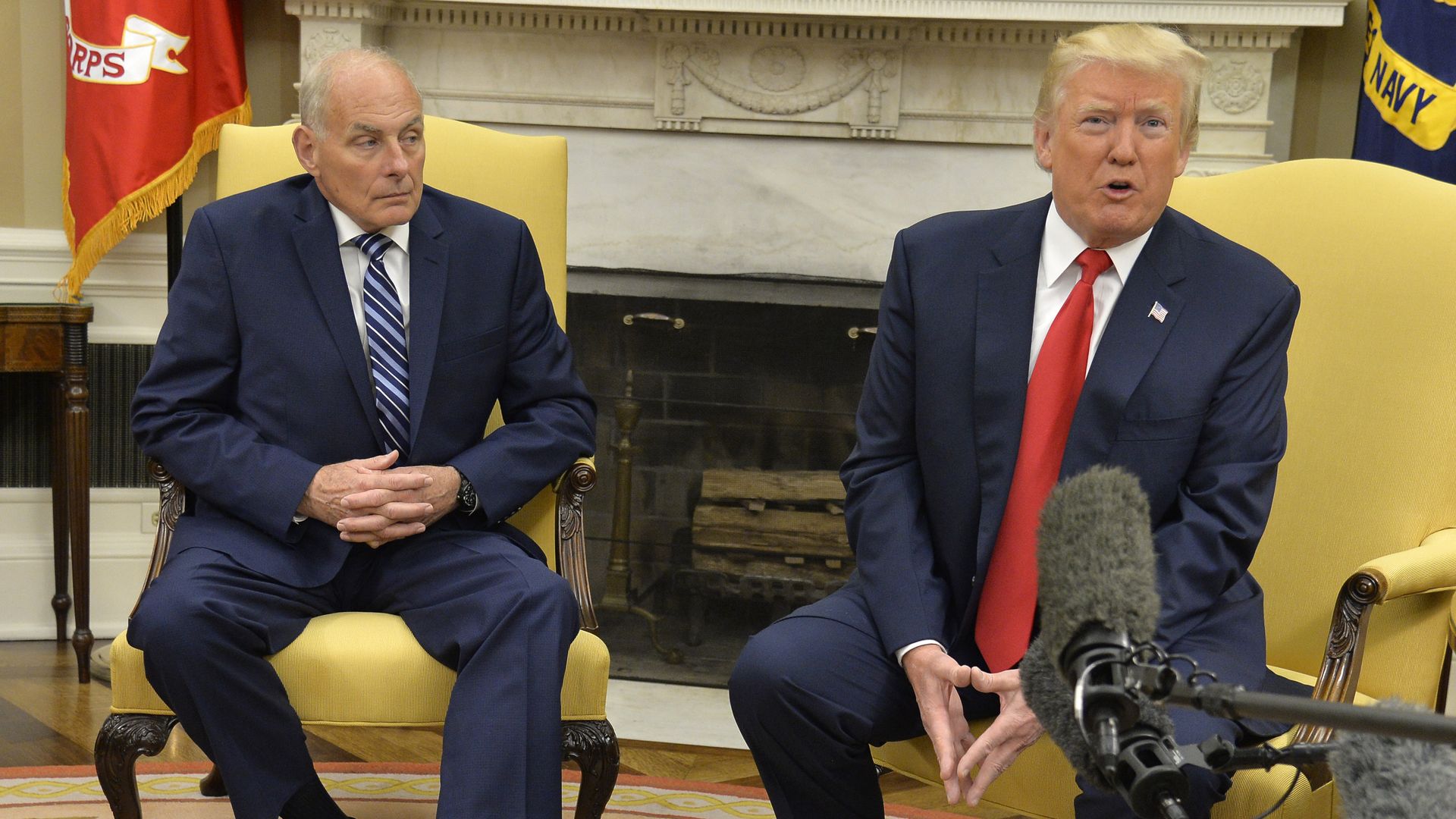 President Donald Trump (R) speaks to the press after the new White House Chief of Staff John Kelly (L) was sworn in, in the Oval Office of the White House, July 31, 2017 in Washington, DC. Kelly, a retired Marine Corps general and formerly secretary of the Department of Homeland Security, replaces R