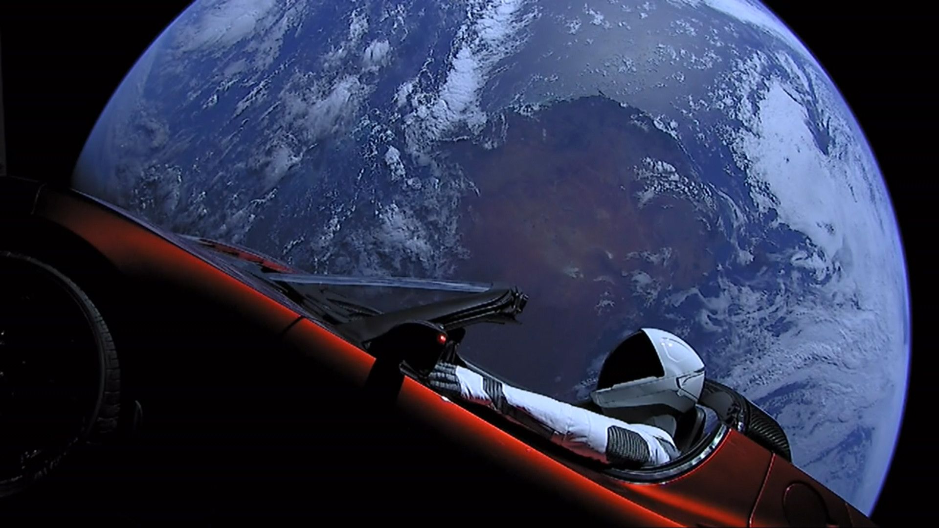A view of SpaceX's Tesla above Earth after launch in 2018.