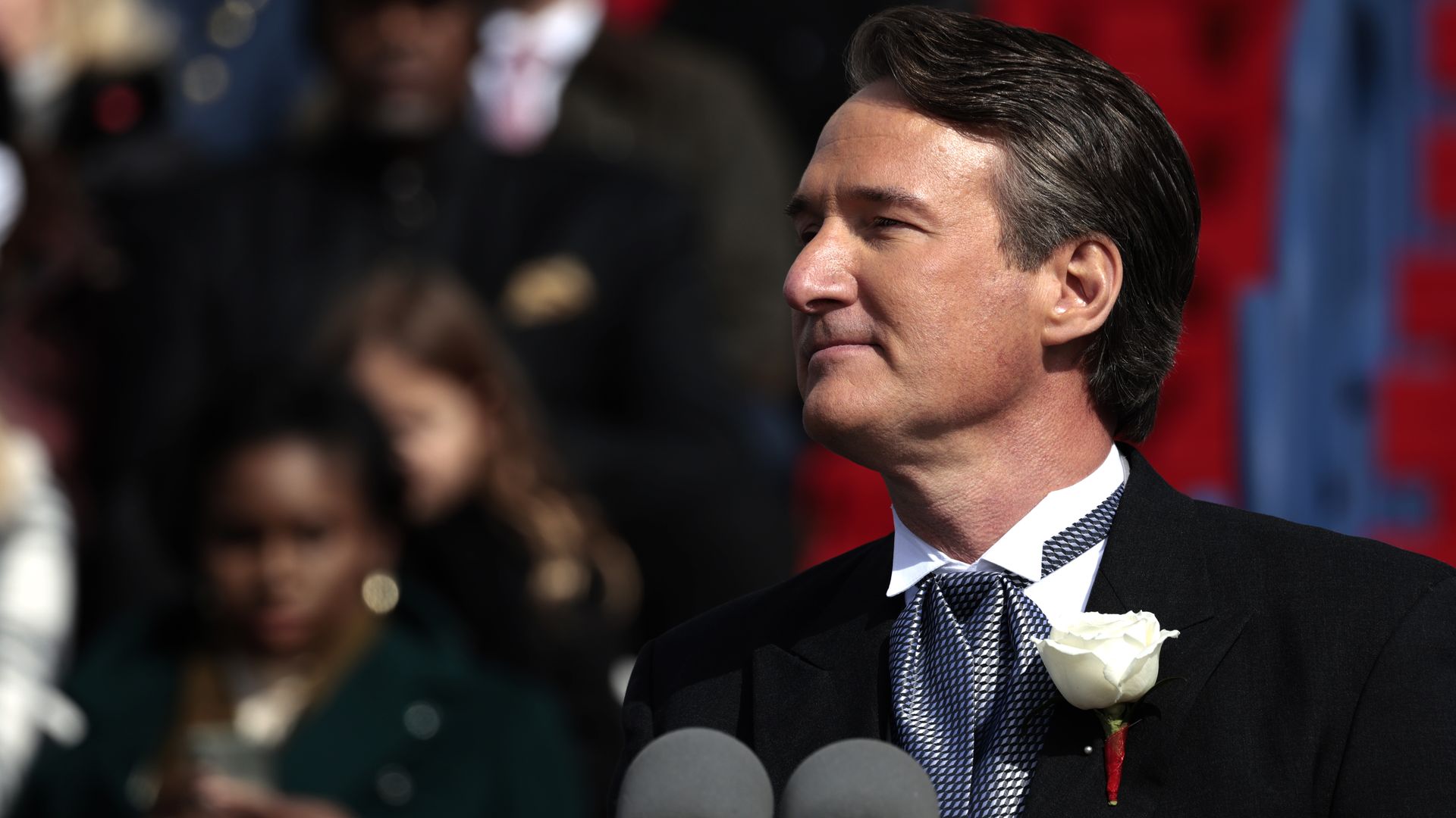 Gov. Glenn Youngkin at a podium being inaugurated