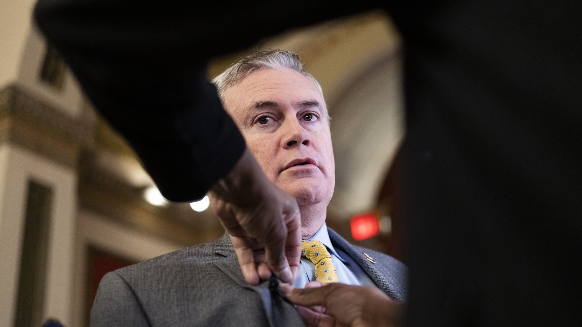 Rep. James Comer, R-Ky., prepares for a television interview in the U.S. Capitol 