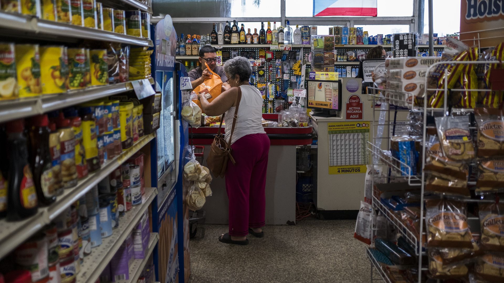 Food Stamps beneficiaries do their groceries shopping at Agranel Supermarket in Manati. 