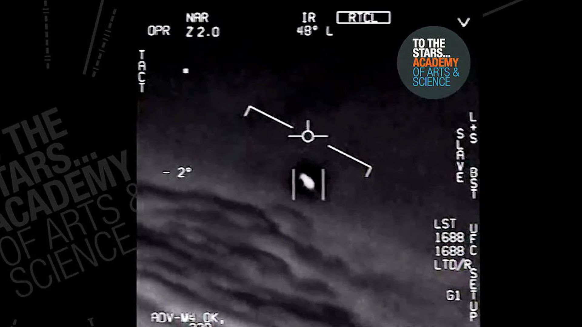 In this image from video by U.S. Navy aircraft, an unidentified object moves near the plane.