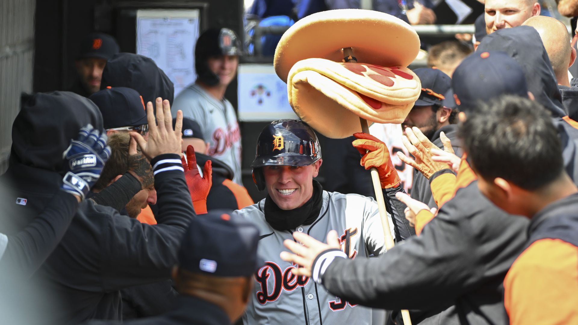 The Tigers' Kerry Carpenter is congratulated by teammates following a home run in Chicago last week.