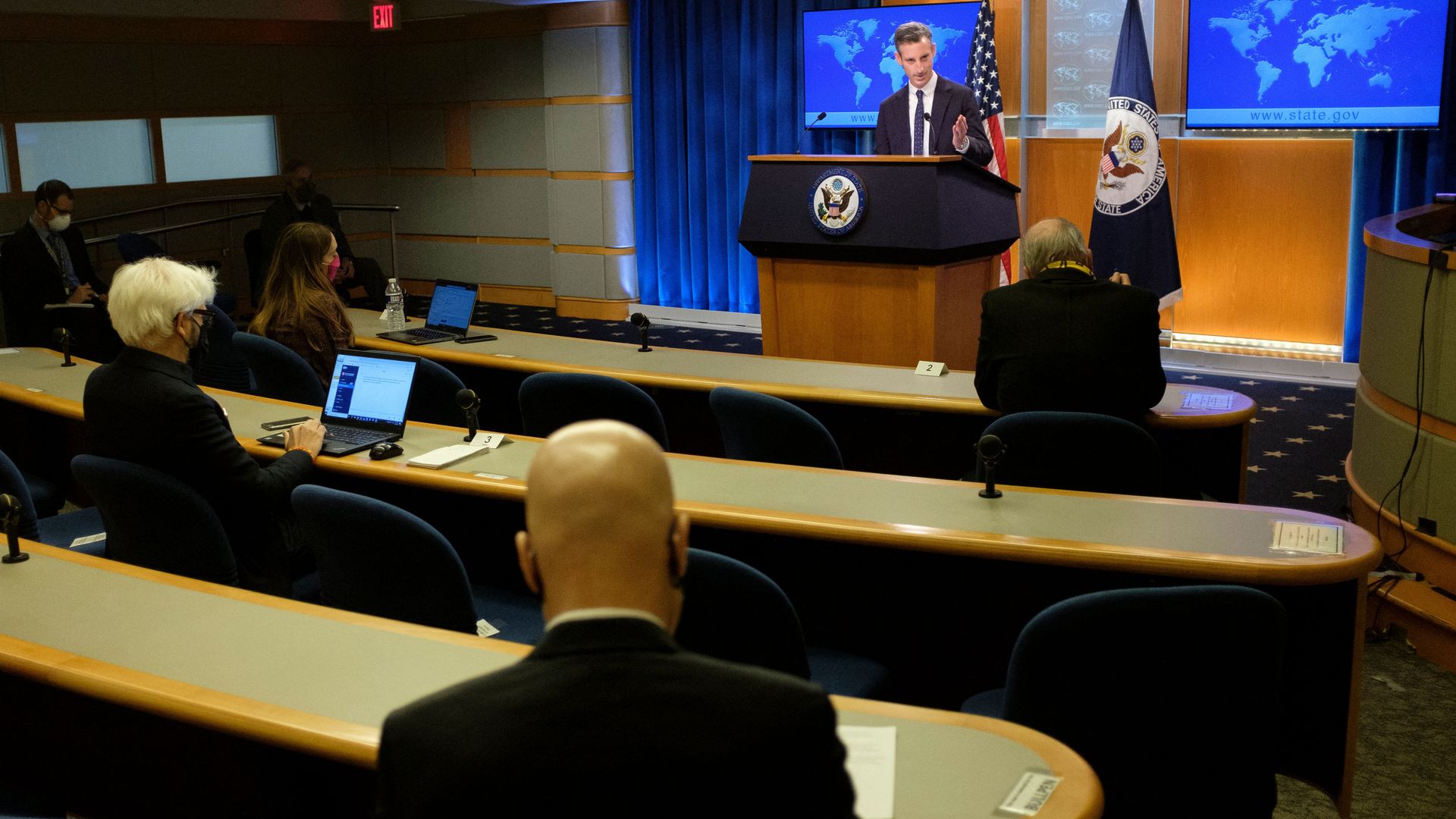 State Department spokesman Ned Price is seen speaking with Matt Lee of the Associated Press.