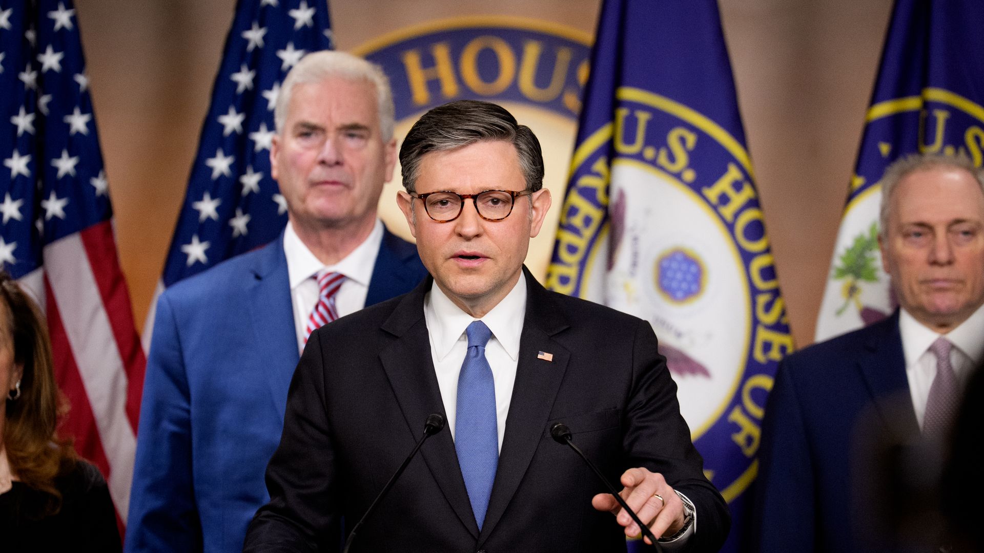 House Speaker Mike Johnson, flanked by Majority Whip Tom Emmer (left) and Majority Leader Steve Scalise, speaks during a news conference at the U.S. Capitol on March 4. 