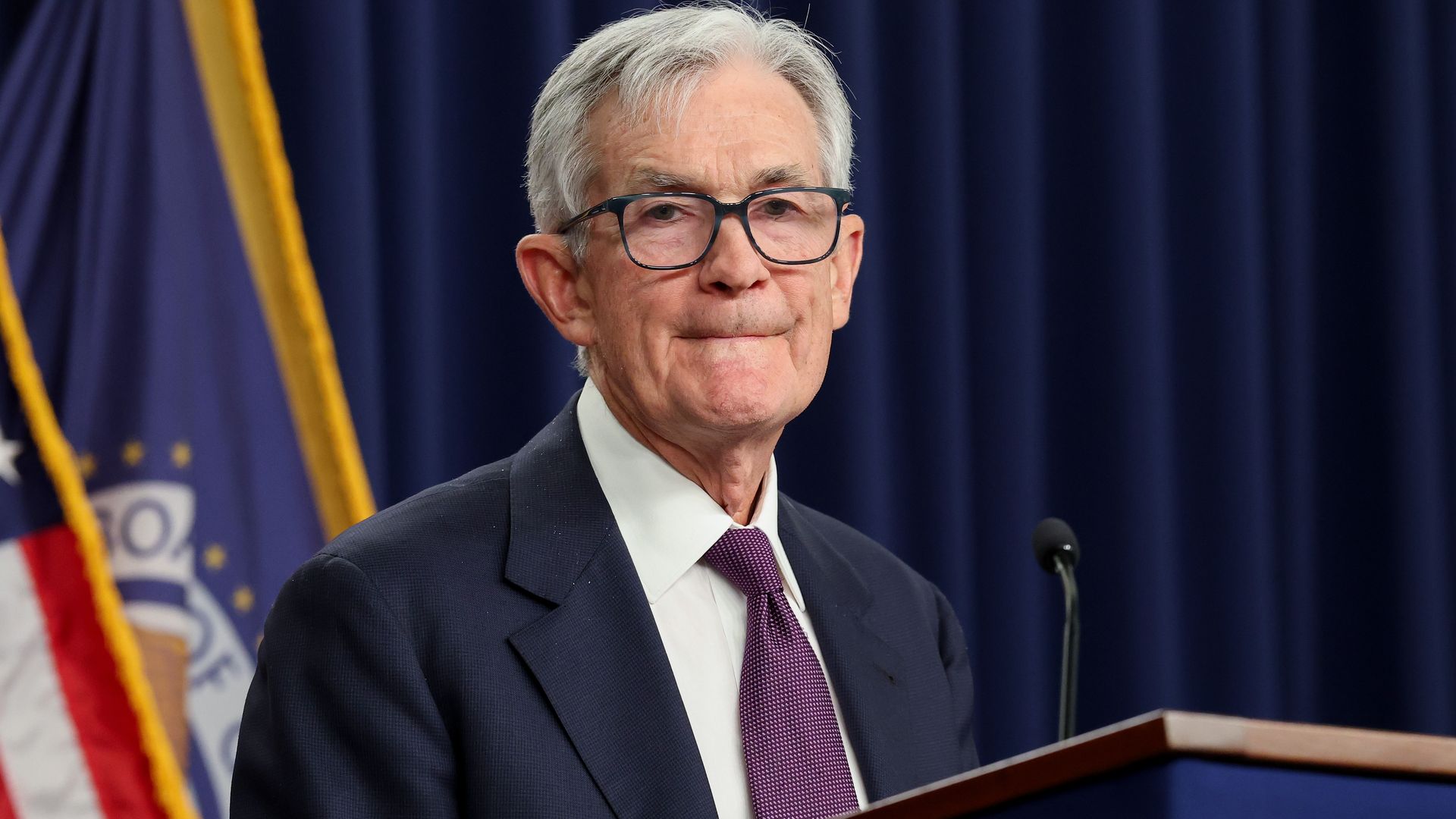 Fed chair Jerome Powell standing at a podium