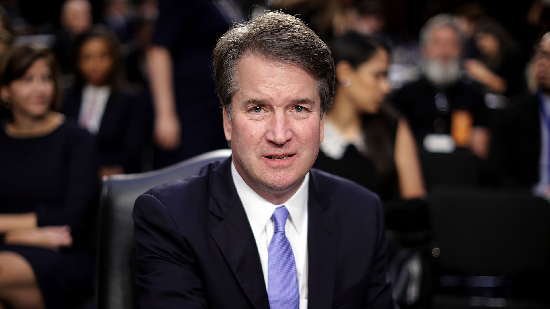Brett Kavanaugh sits behind his desk during the Senate confirmation hearings