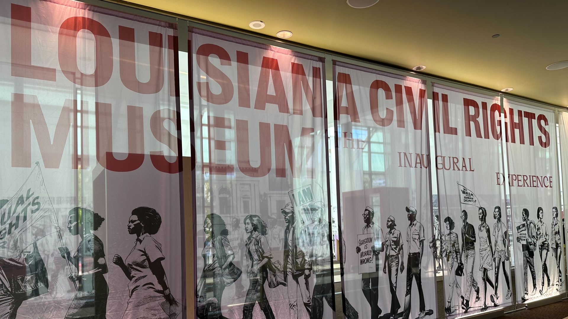 Sign shows the interior of the Louisiana Civil Rights Museum in New Orleans