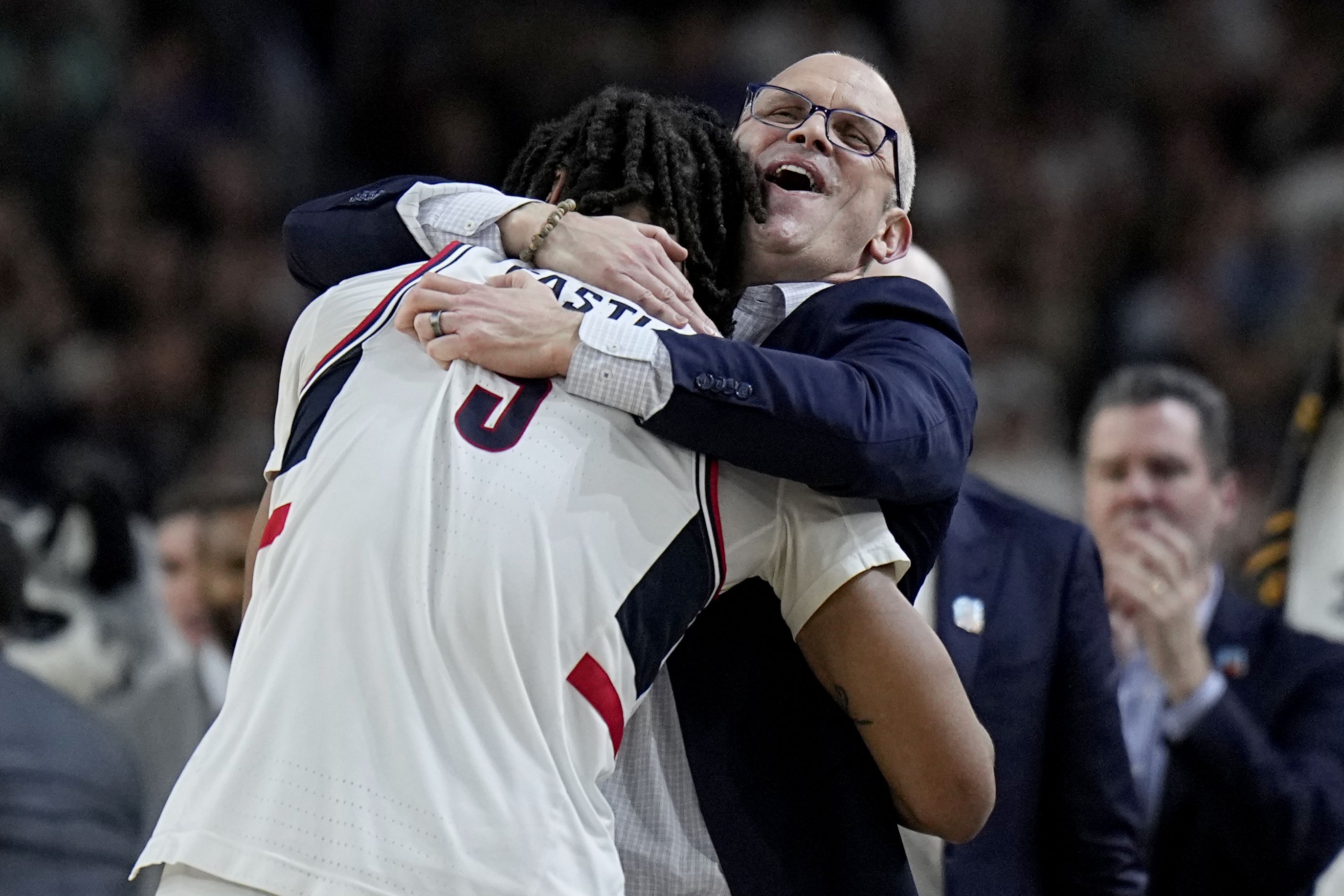 UConn head coach Dan Hurley hugs guard Stephon Castle during the national championship game yesterday.