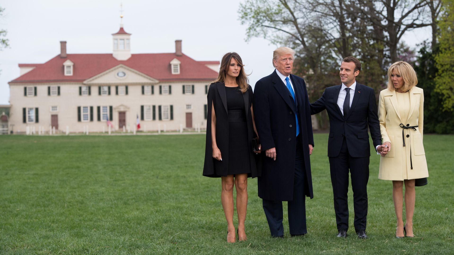 Melania, Trump, Macron and Brigitte stand in front of George Washington's home