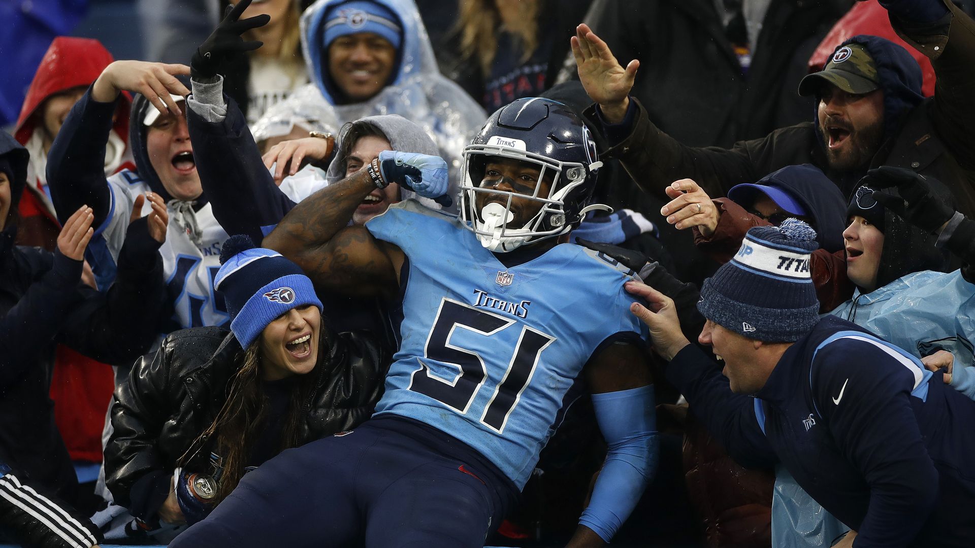 Linebacker David Long celebrates with fans after making a fourth-quarter interception. 