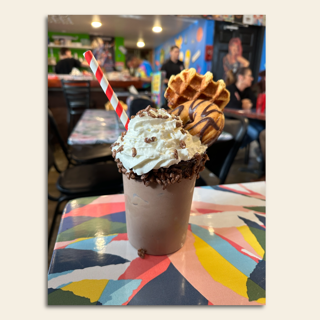 Dare to try this colossal milkshake at a throwback-themed pizza restaurant  in Rogers - Axios NW Arkansas