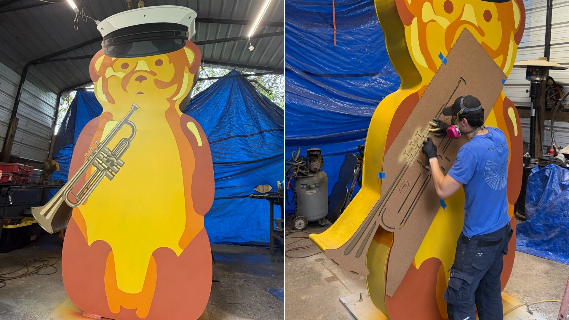 Two-panel view of a large orange and yellow bear cutout in a workshop. Left shows the bear holding a trombone and wearing a captain’s hat; right shows a worker in blue shaping a cardboard panel on it.