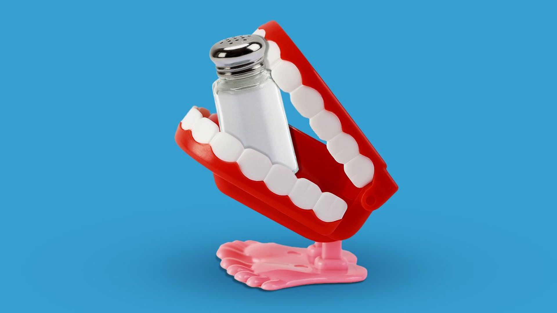 Illustration of toy teeth with a salt shaker between the set