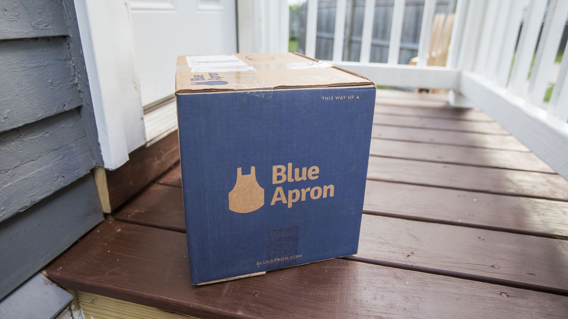A Blue Apron box on a doorstep