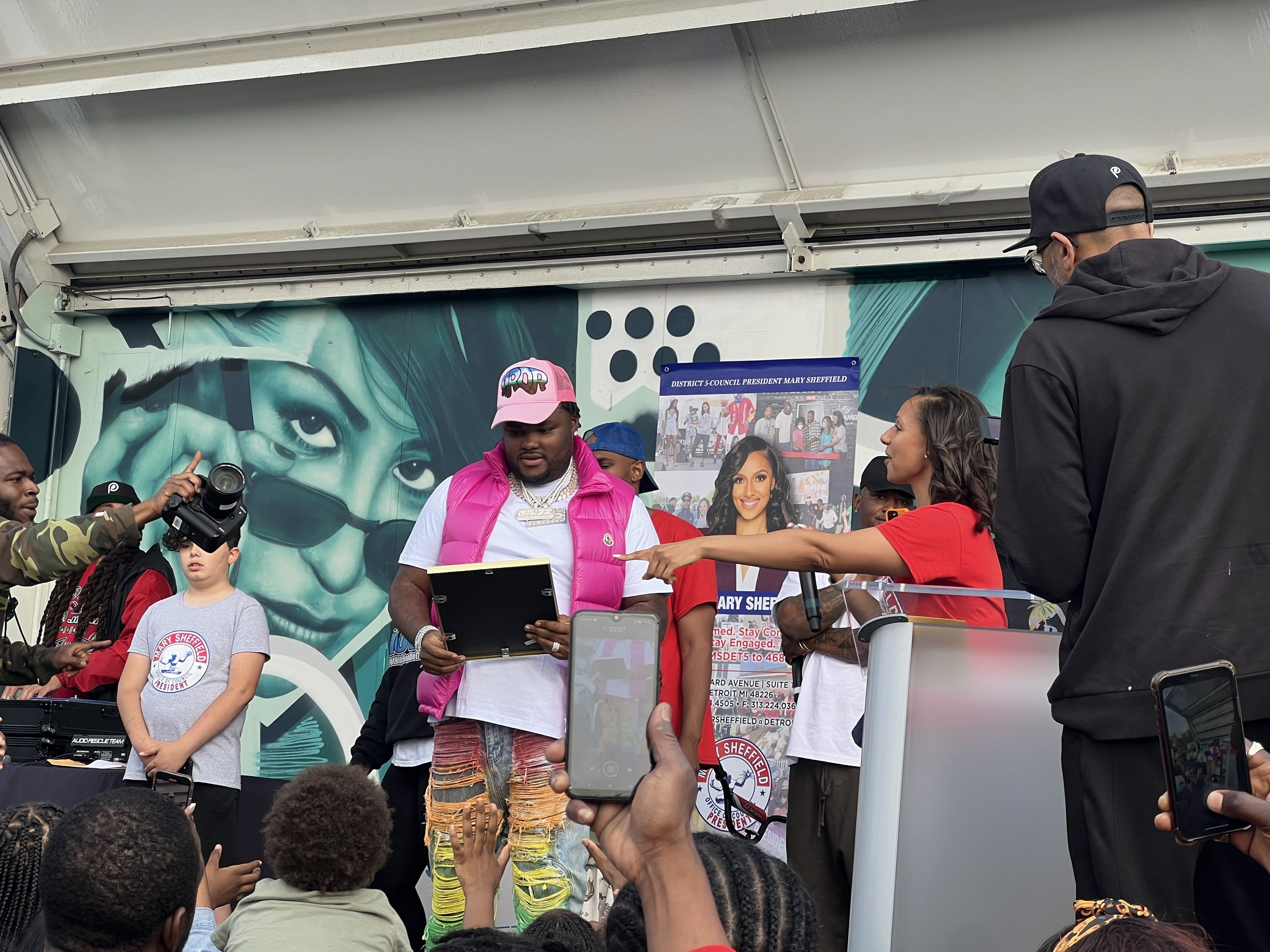 Rapper Tee Grizzley is presented a Spirit of Detroit award from City Council President Mary Sheffield at her annual Occupy the Corner event last month.