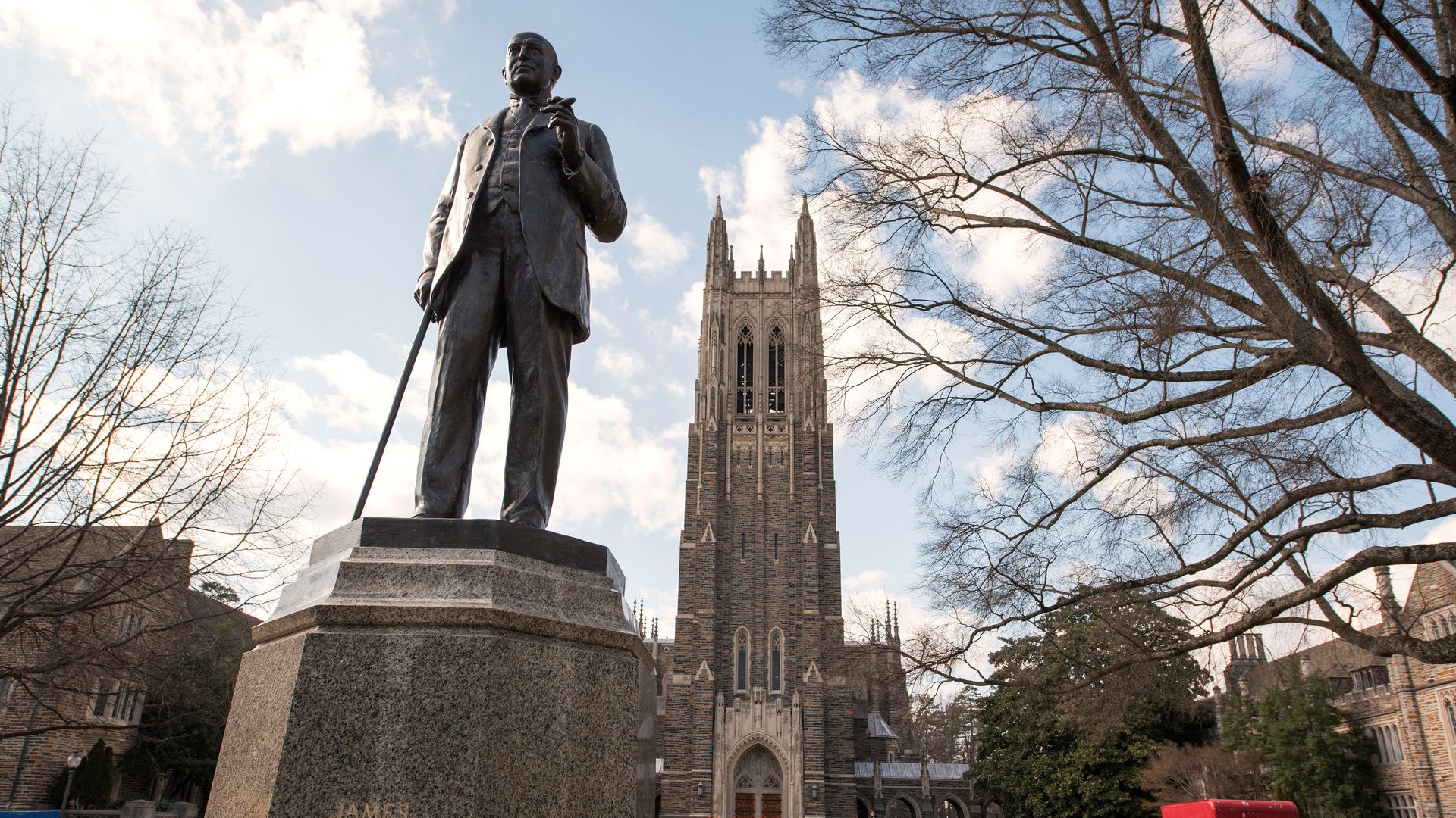 Duke statue before chapel on campus.