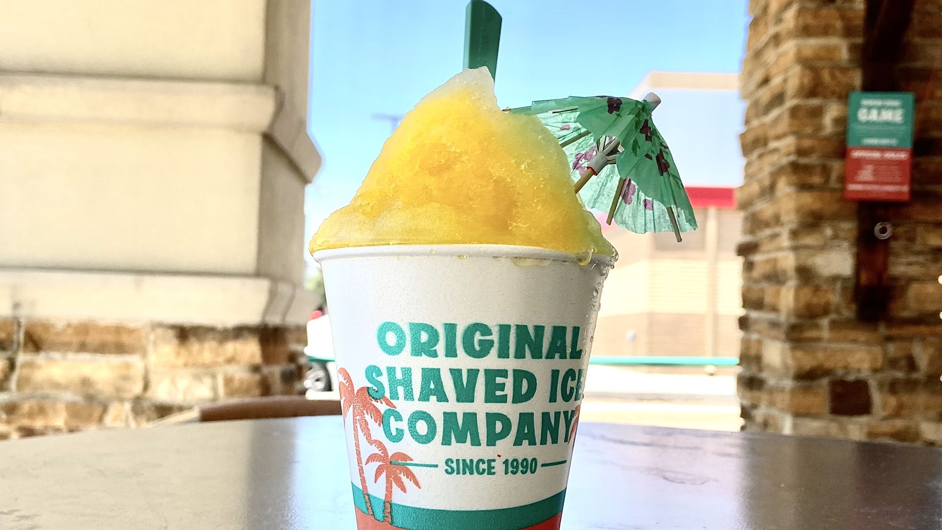 A large cup of pineapple shaved ice