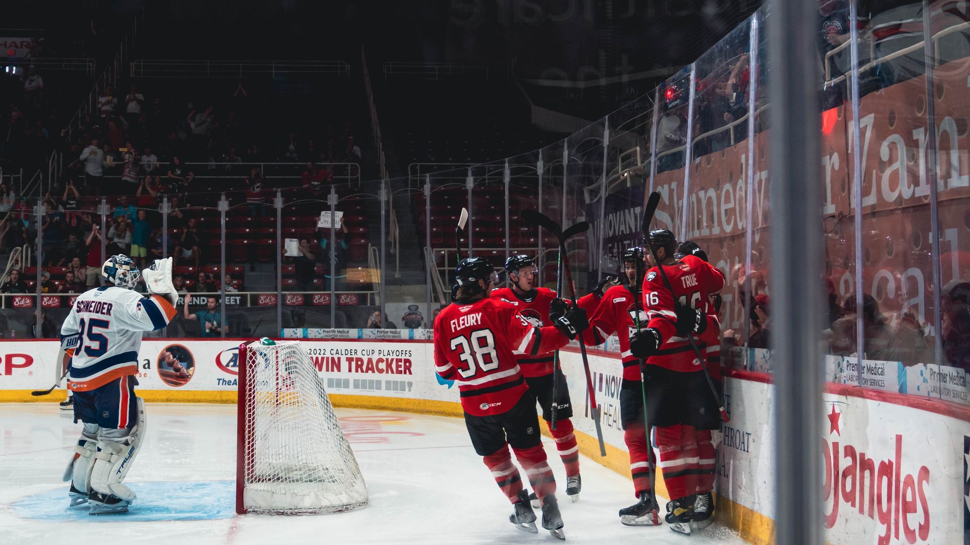 Checkers celebrate scoring a goal.