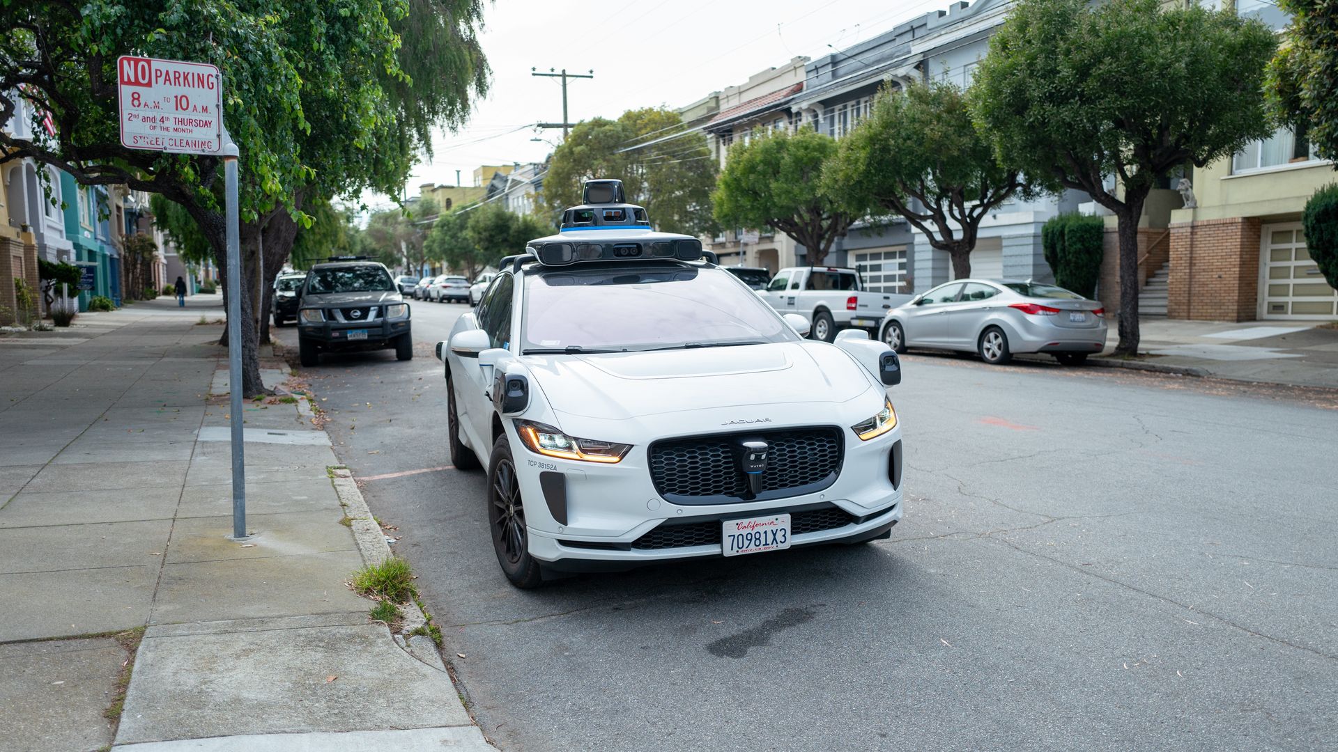 A Waymo self-driving car is seen in the Inner Richmond neighborhood of San Francisco
