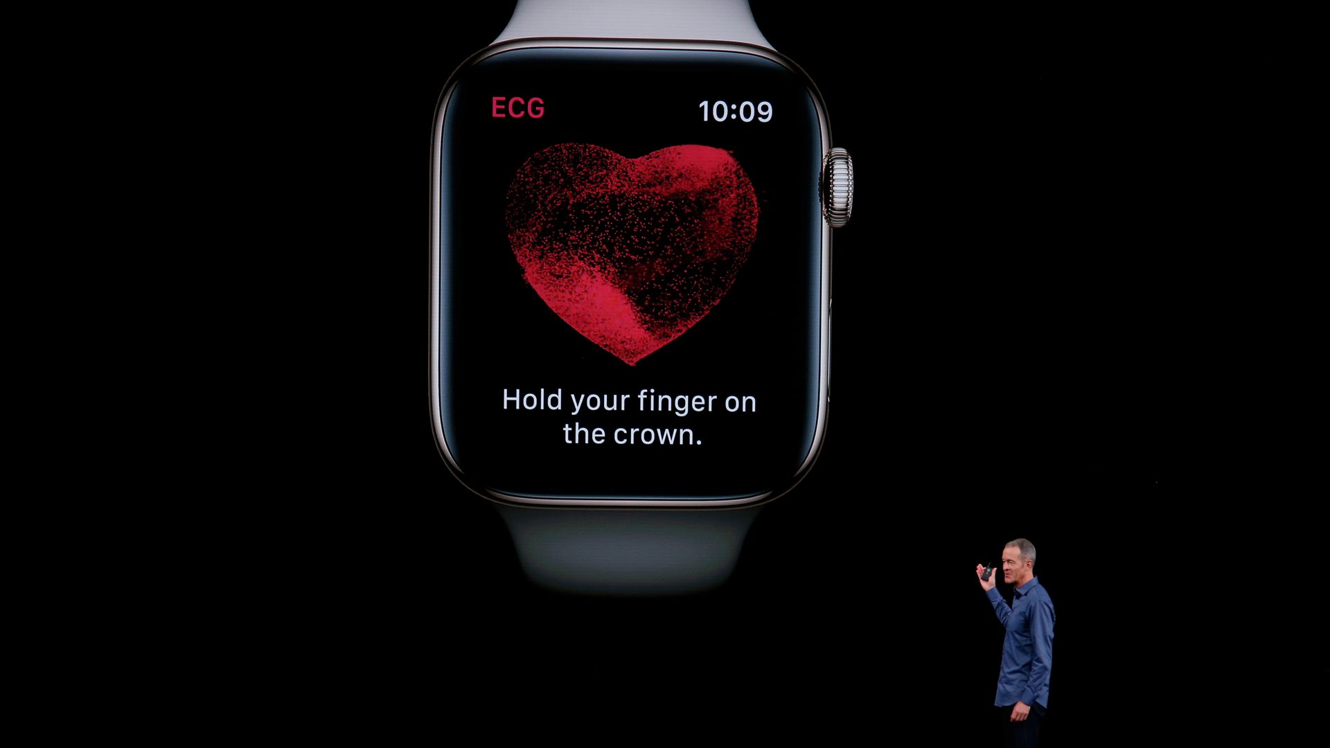 Apple executive presents apple watch on stage