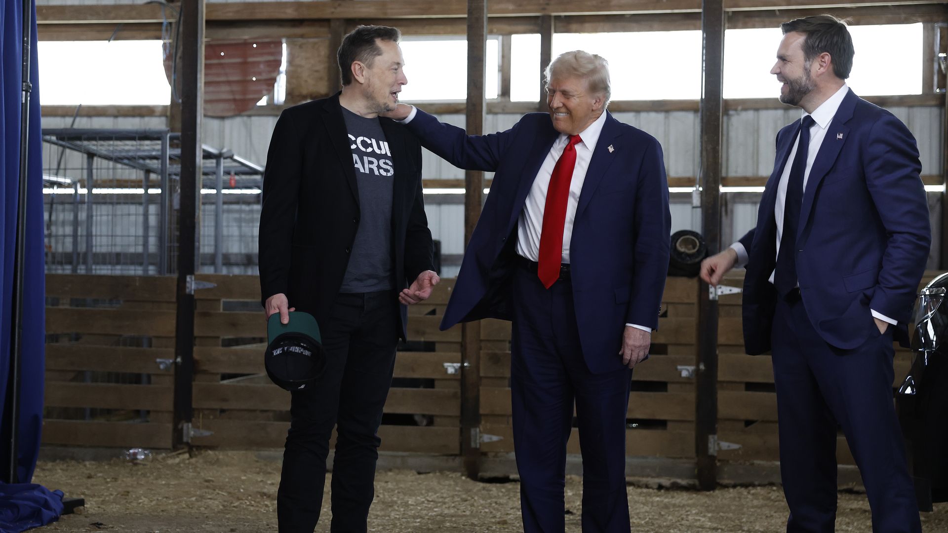 Men in barn