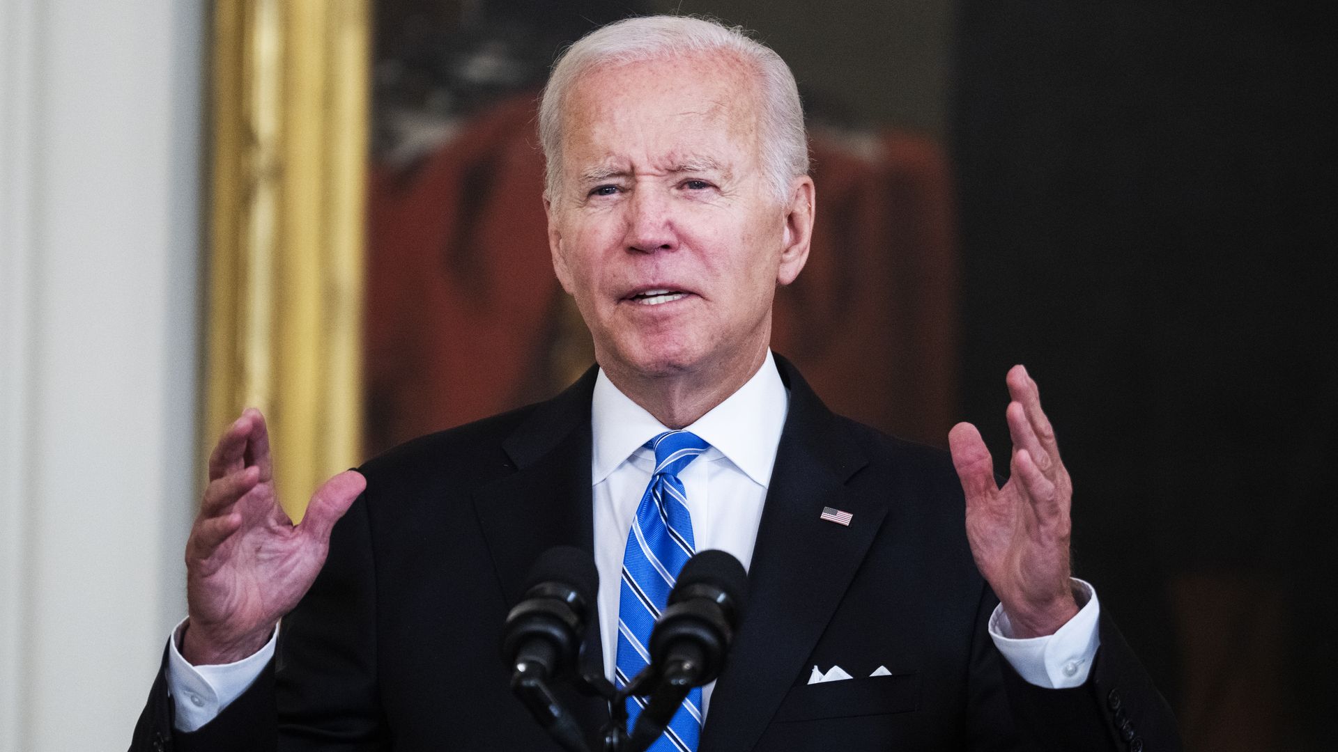 President Biden speaks during a ceremony at the White House.