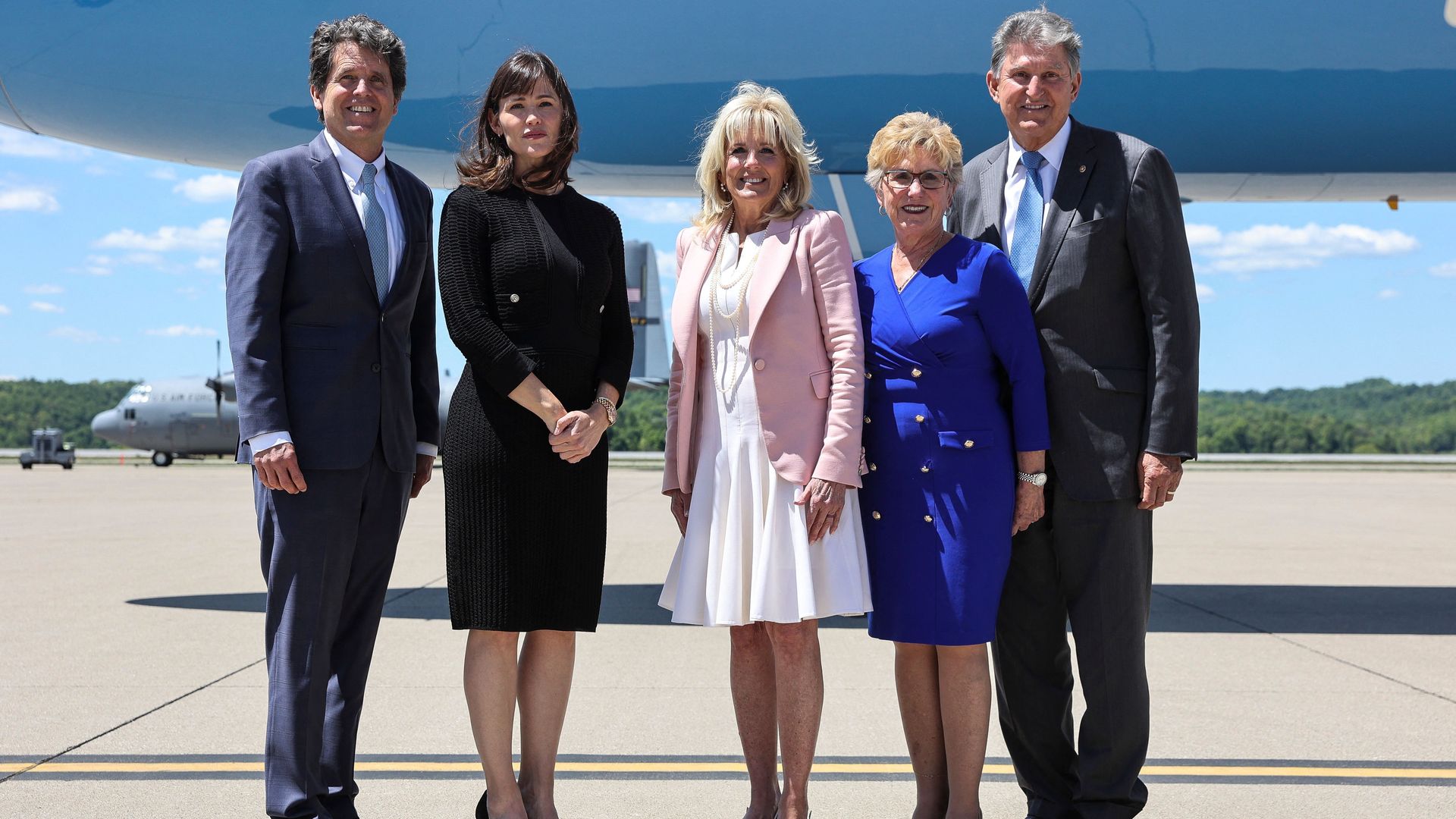 First lady Jill Biden is seen posing maskless with actress Jennifer Garner and Sen. Joe Manchin after the CDC lifted its outdoor mask mandate.