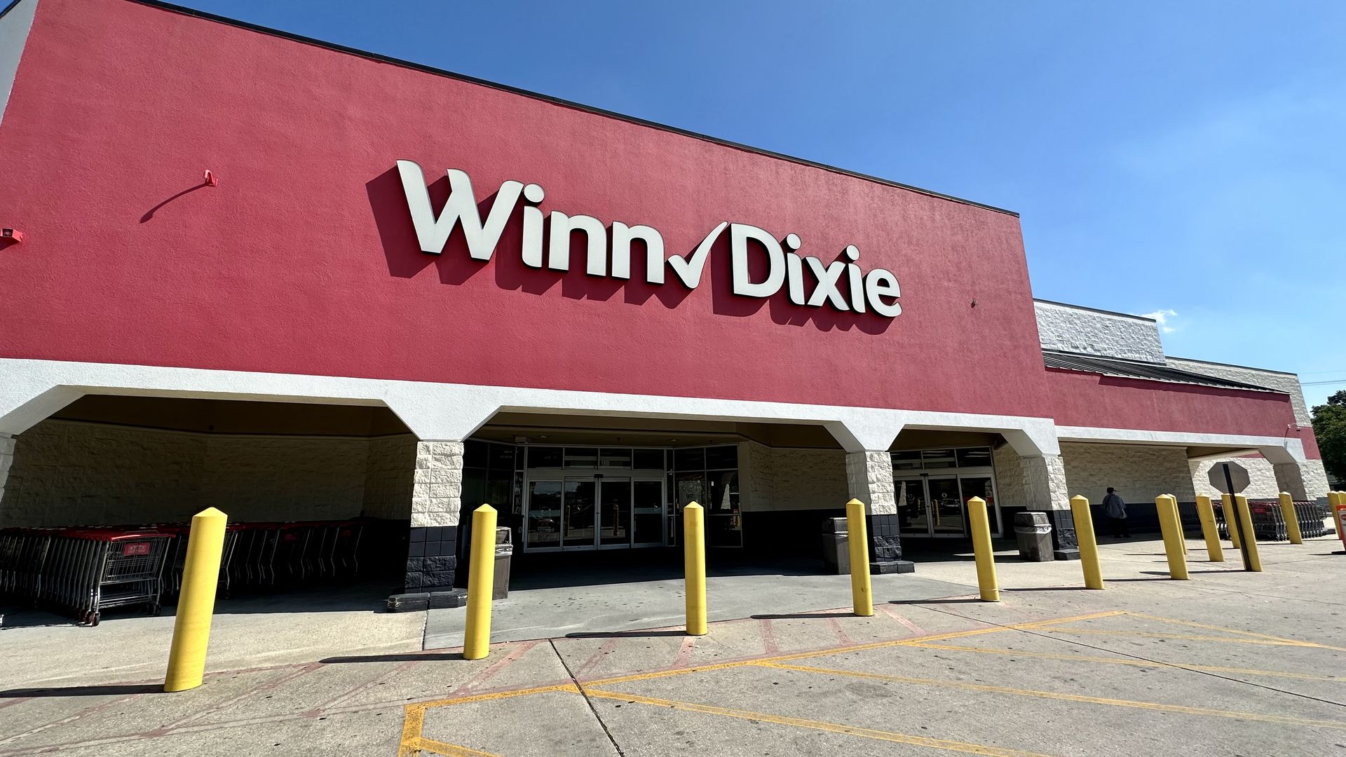 Photo shows the red exterior of Winn-Dixie in Metairie.
