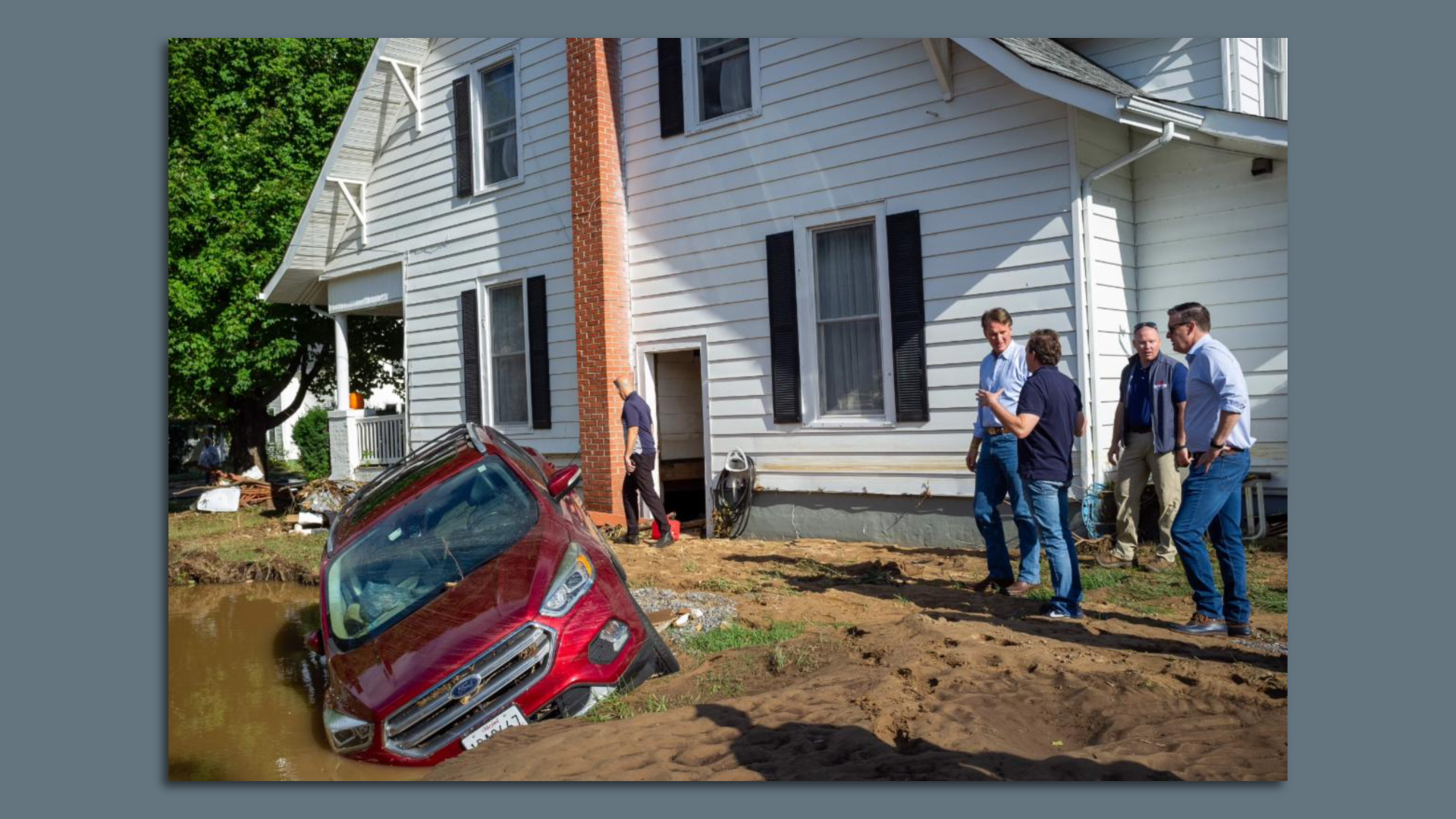 a car falling into a sink hole