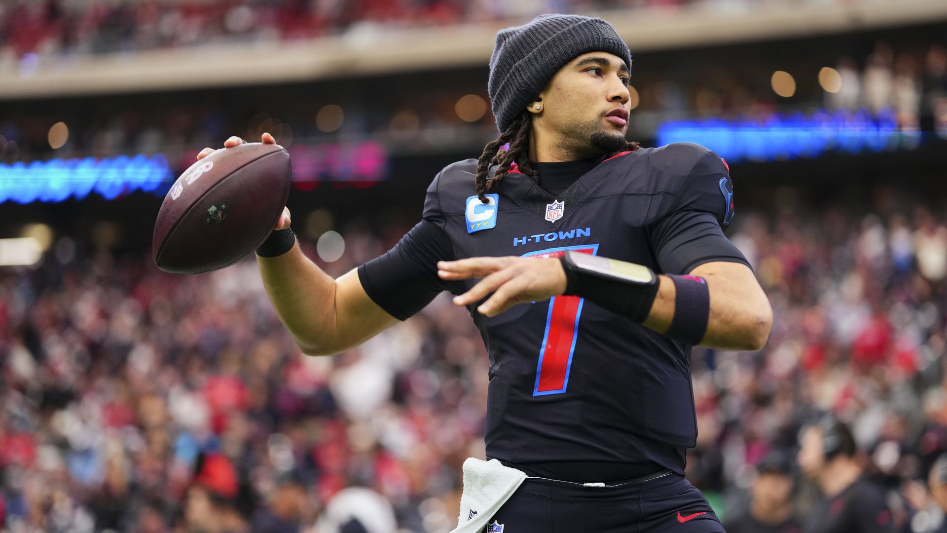 Texans quarterback C.J. Stroud throws a ball during warm ups before a game