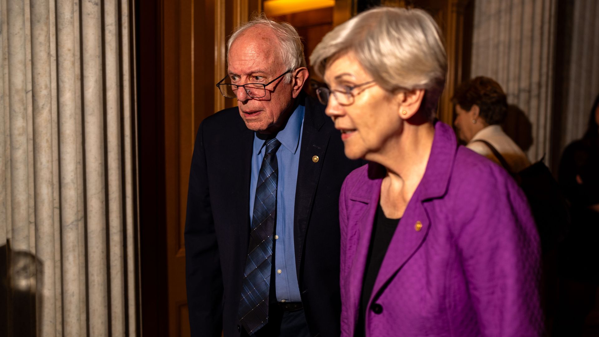U.S. Sens. Bernie Sanders (I-VT) and Elizabeth Warren (D-MA) arrive for a vote at the Capitol on September 25, 2024 in Washington, DC. 
