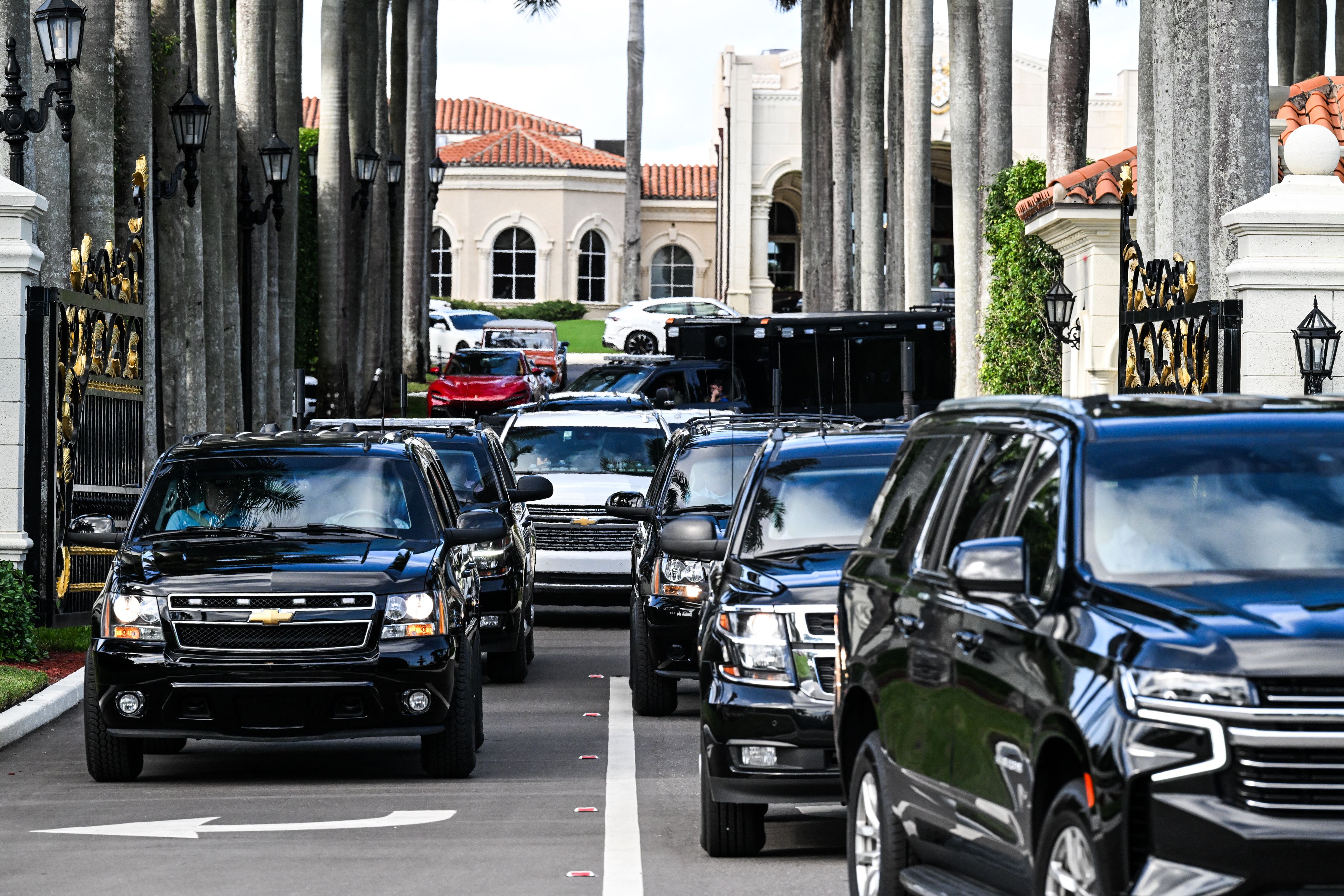 The motorcade carrying US President-elect Donald Trump leaves Trump International Golf Club in West Palm Beach, Florida on December 26, 2024. (Photo by CHANDAN KHANNA / AFP) (Photo by CHANDAN KHANNA/AFP via Getty Images)