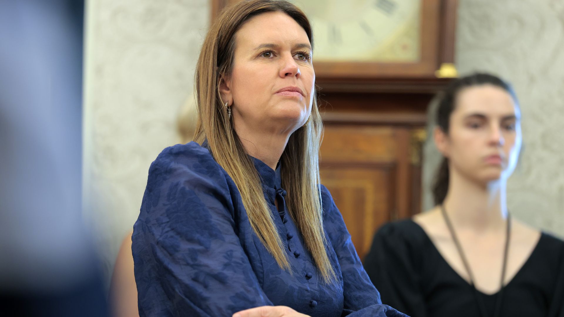 Arkansas Gov. Sarah Huckabee Sanders attends an event on natural disaster preparedness with President Donald Trump in the Oval Office at the White House on June 10, 2025