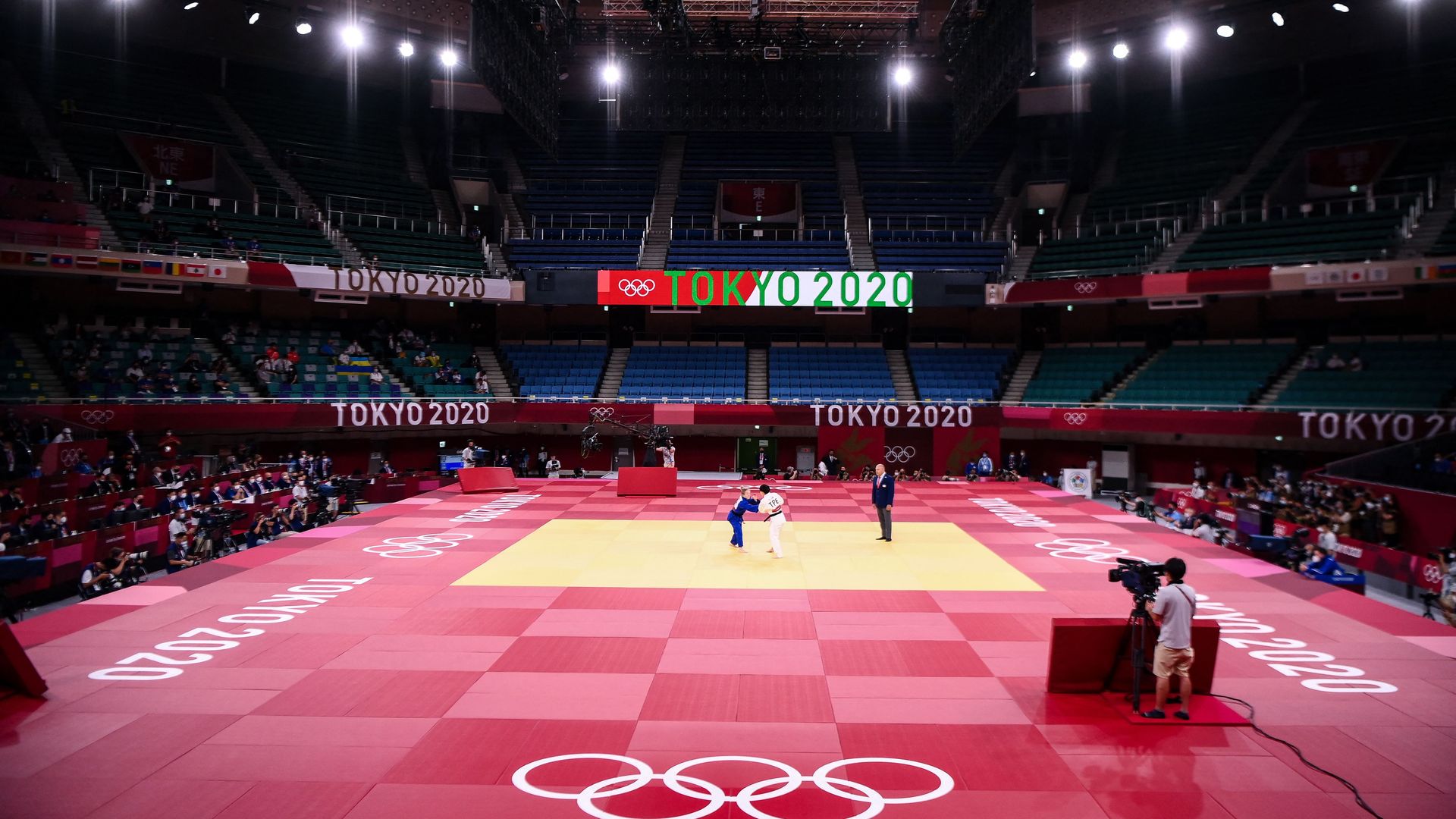 Judokas compete during the Tokyo 2020 Olympic Games at the Nippon Budokan in Tokyo on July 24, 2021.