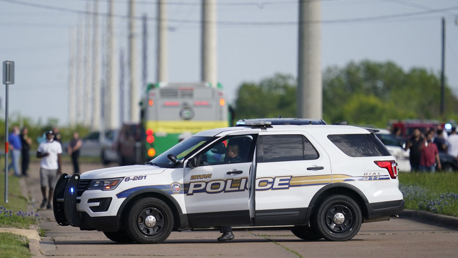A police officer blocking a road near the scene of a mass shooting in Bryan, Texas, on April 8.