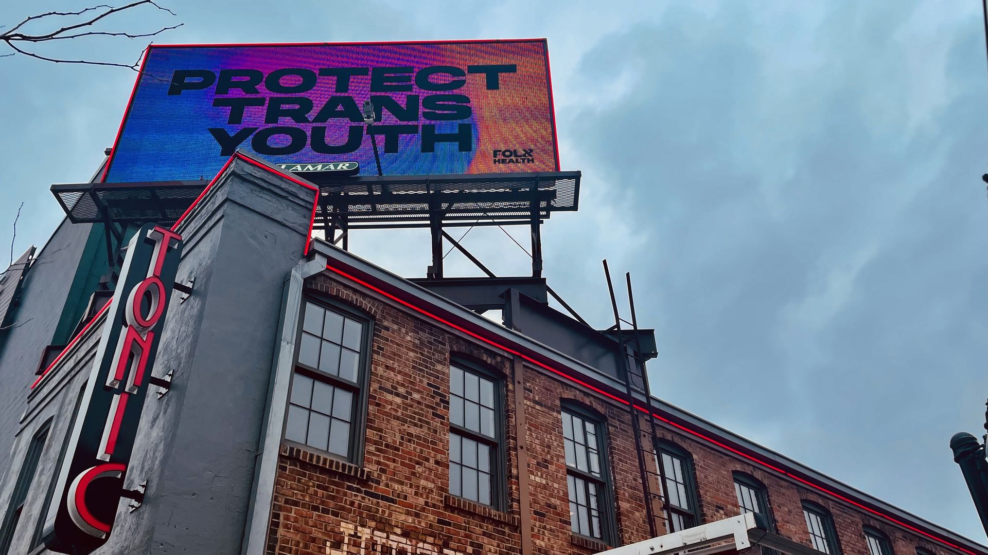 A photo of a "Protect Trans Youth" billboard in Des Moines.