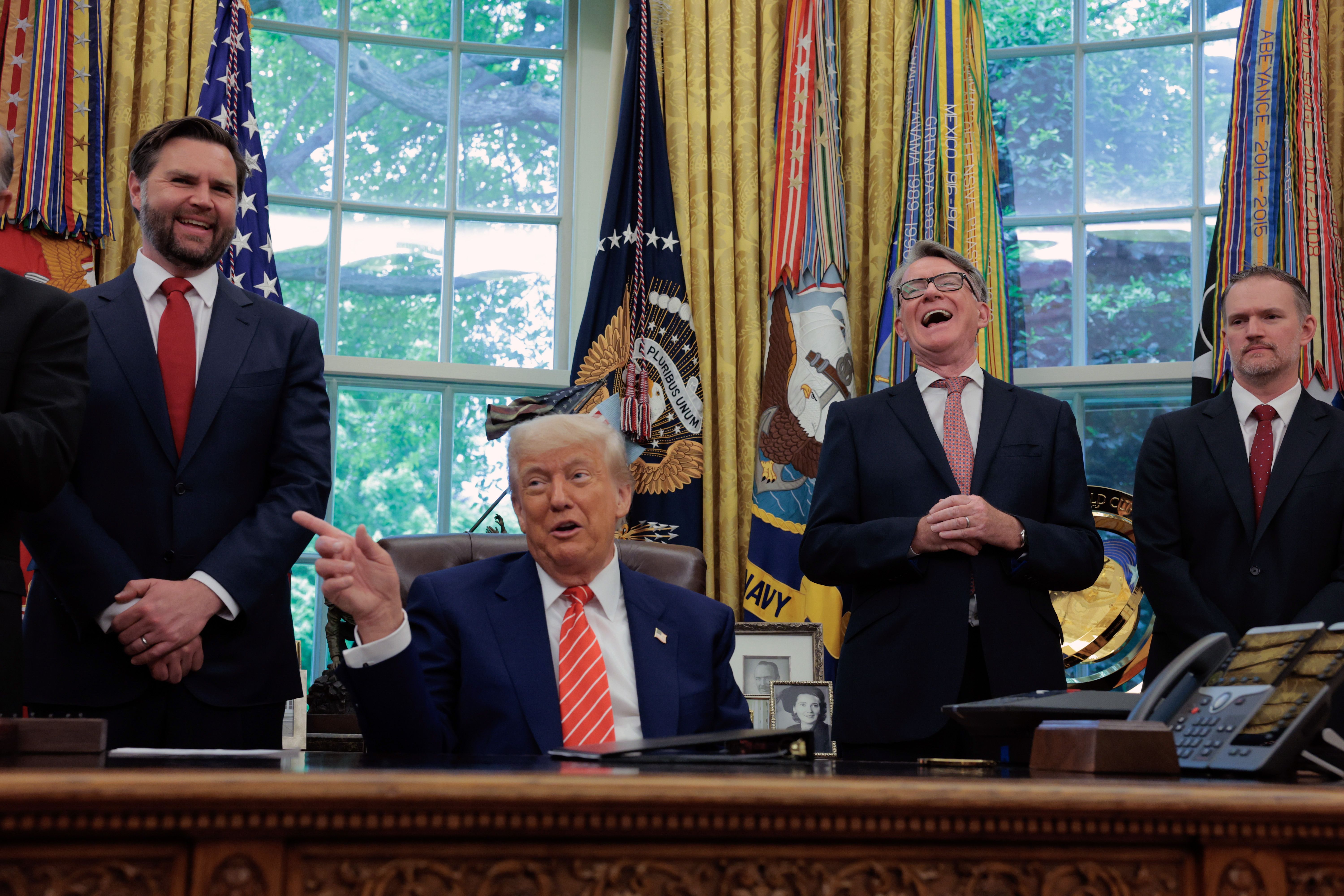 WASHINGTON, DC - MAY 08: U.S. President Donald Trump along with (L-R) Vice President JD Vance, Peter Mandelson, British Ambassador to the United States, and US Trade Representative Jamieson Greer address reporters in the Oval Office at the White House on May 08, 2025 in Washington, DC. During his re
