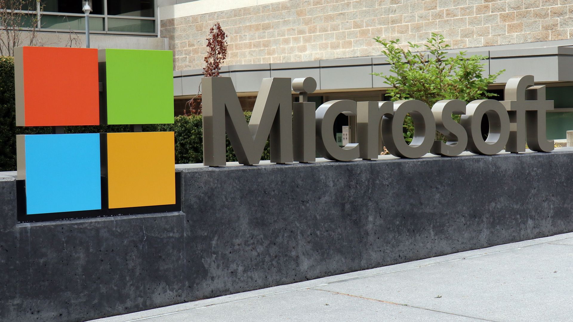 Photo of the Microsoft logo in front of a building