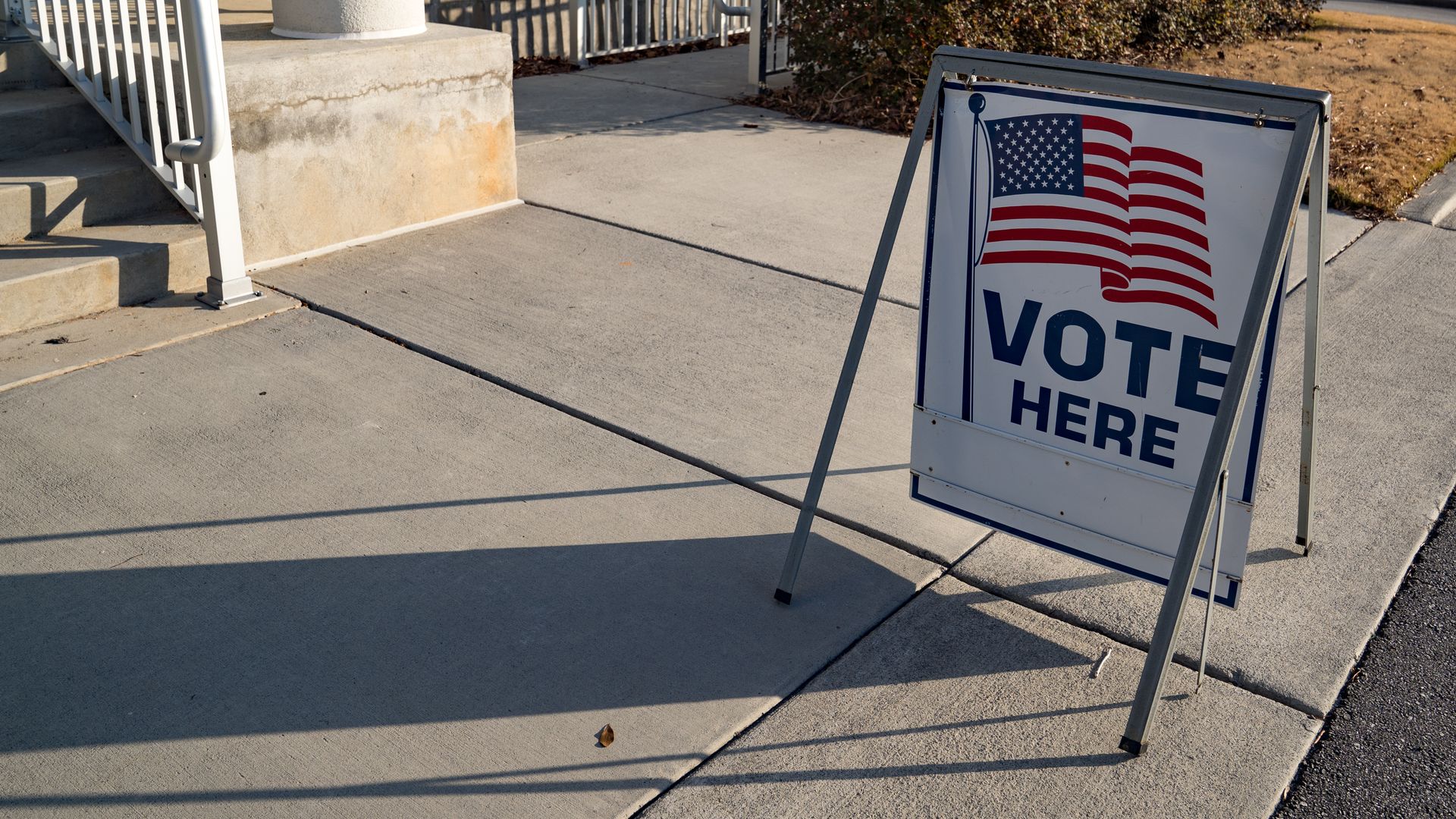 Vote here sign