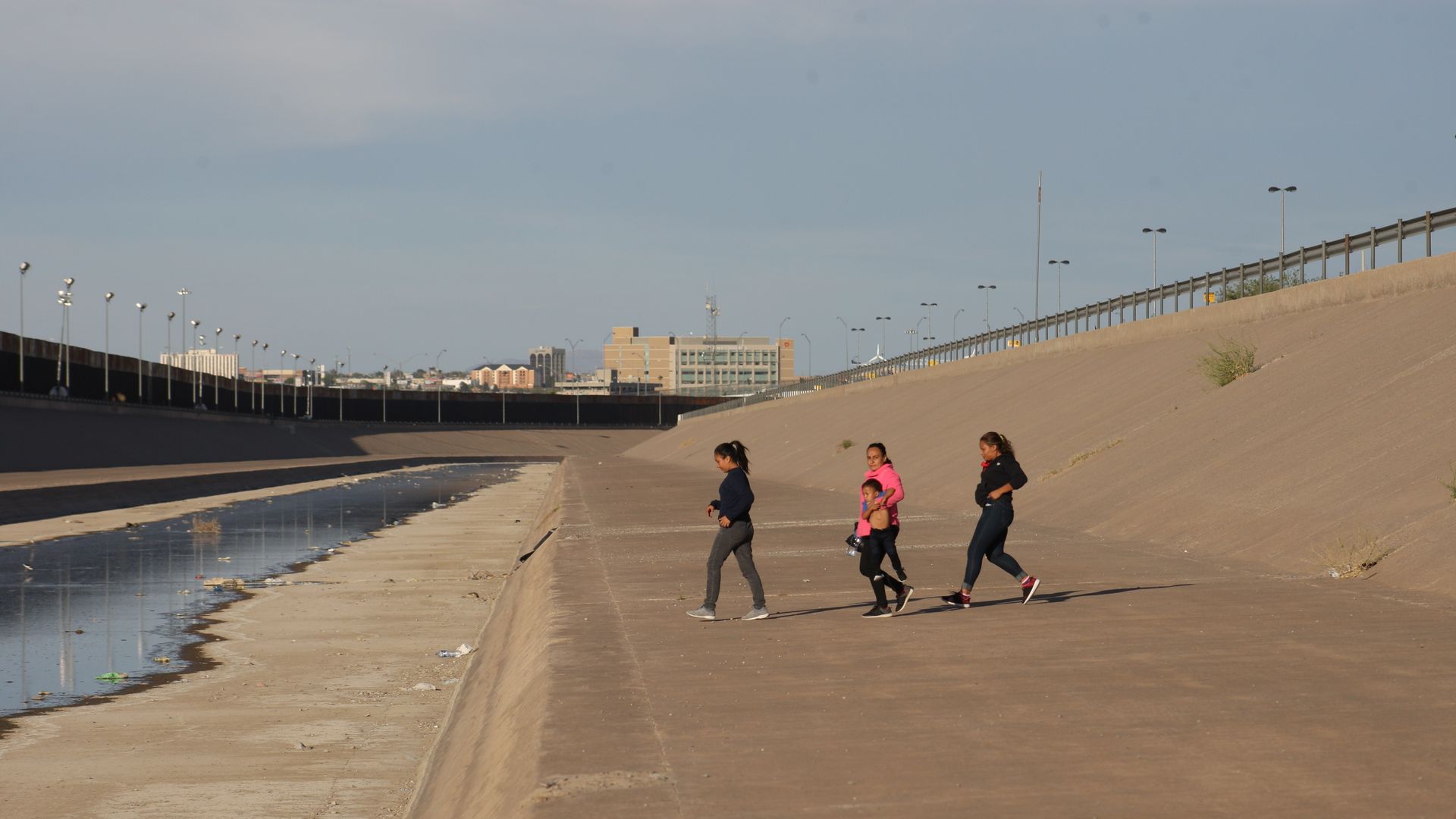 Three migrants cross the border to turn themselves into border patrol agents.
