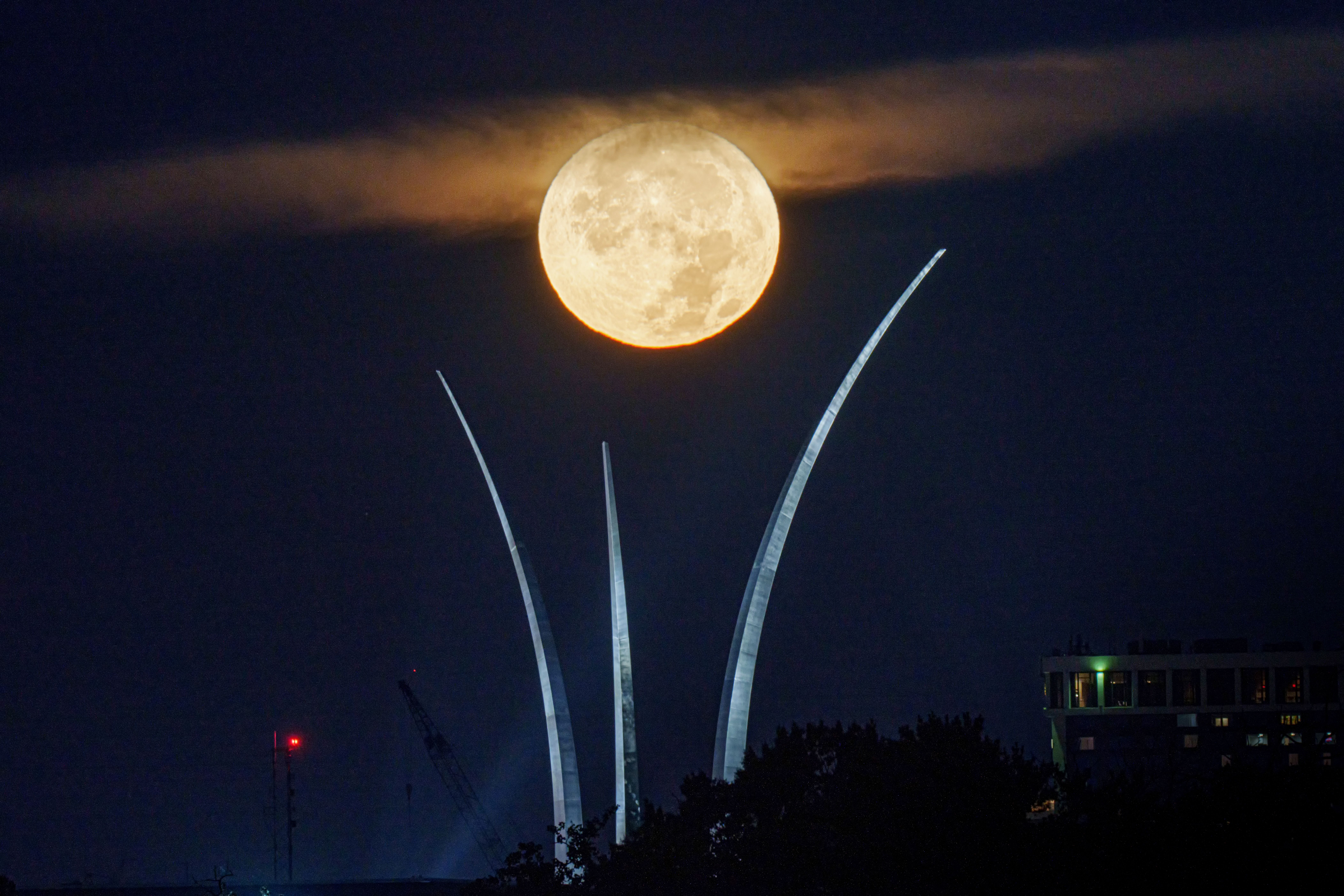 The full Super Blue Moon is centered in the spires of the U.S. Air Force Memorial early in the morning on August 19, 2024 in Arlington, Virginia. 