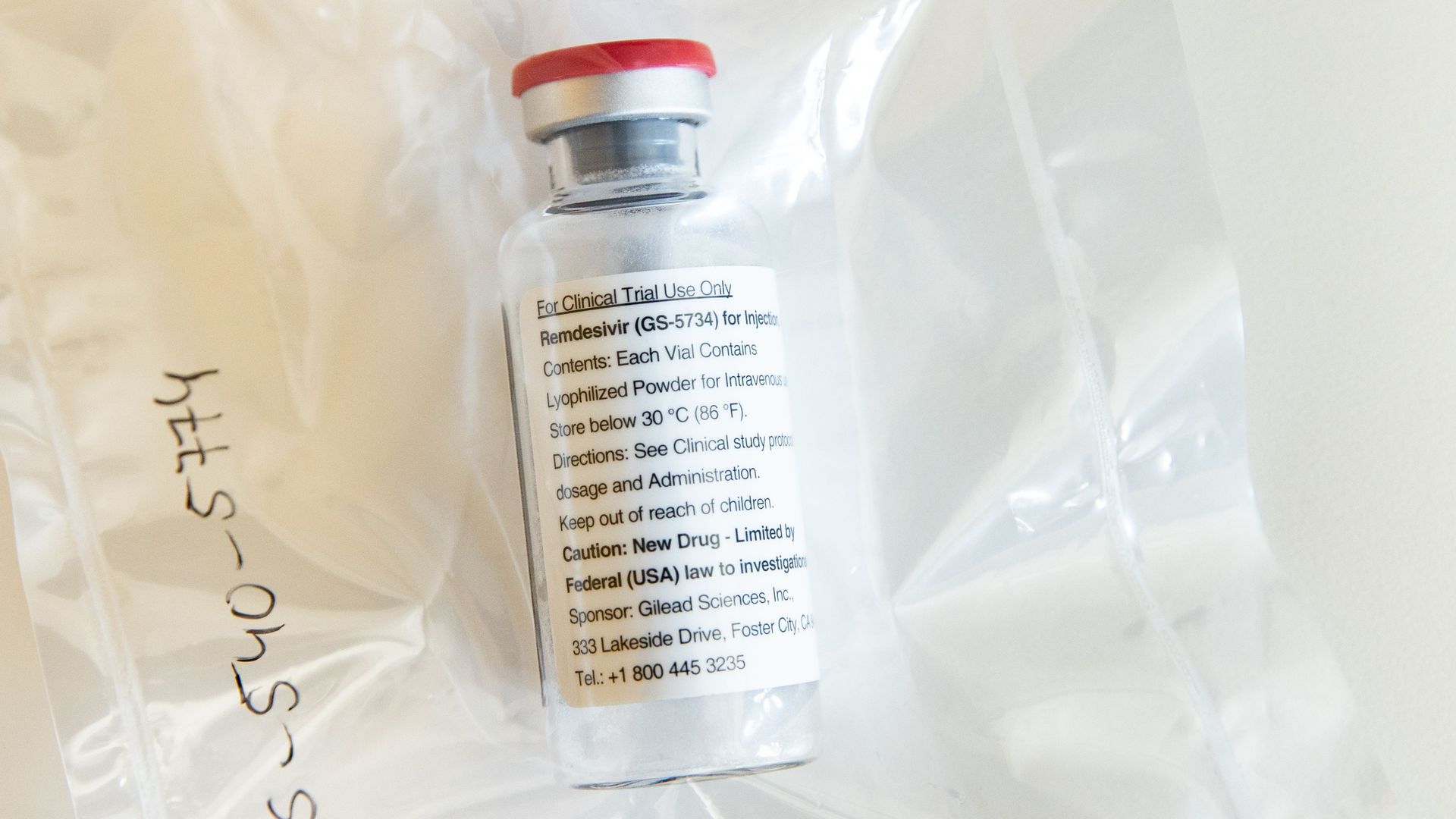 One vial of the drug Remdesivir lies on a table. 
