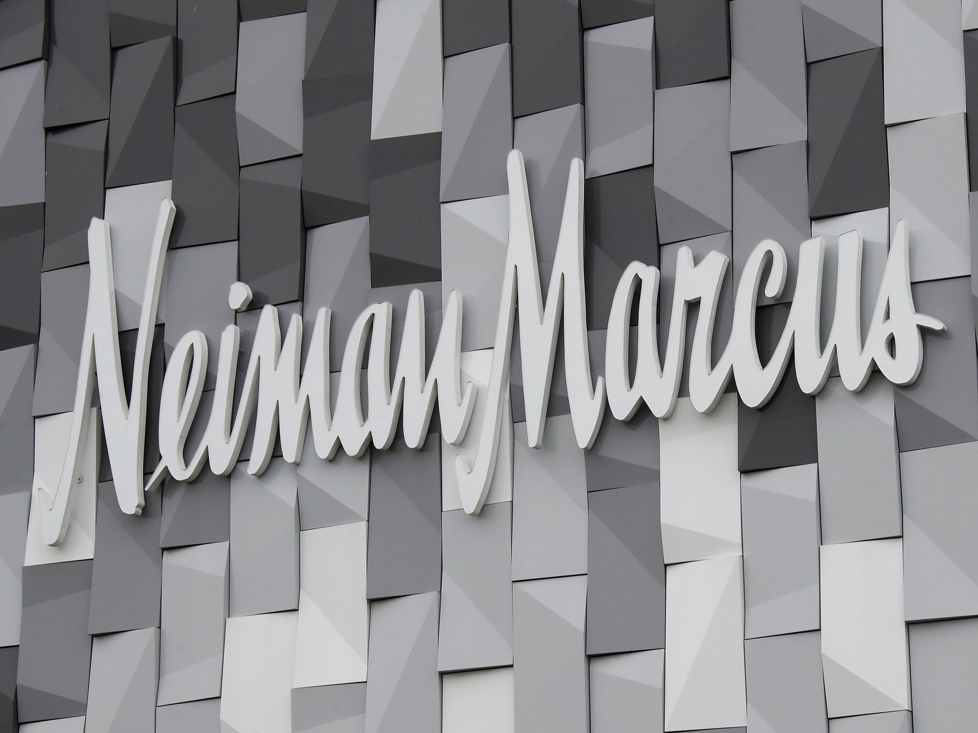 Neiman Marcus holds tight to top standing in luxury retailing