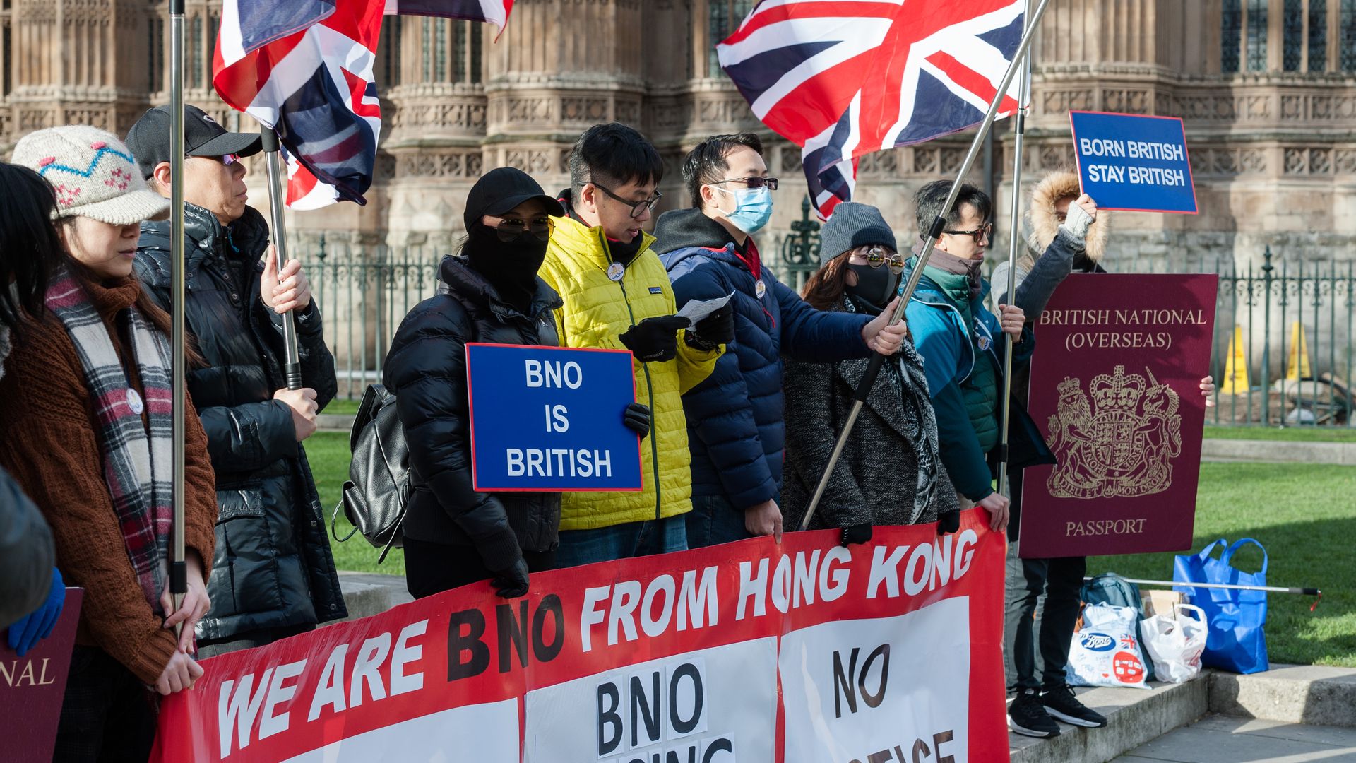 A group of Hong Kong citizens protest outside Houses of Parliament in London against the limited rights of British overseas passport holders in Hong Kong on 29 January