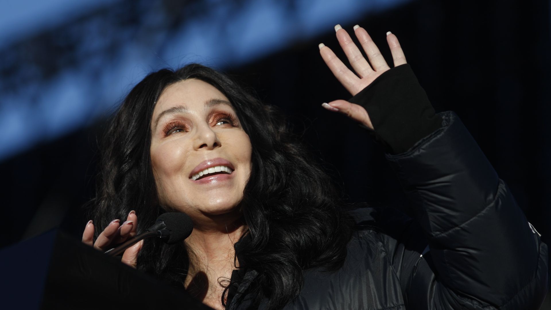 Cher performs on stage. 