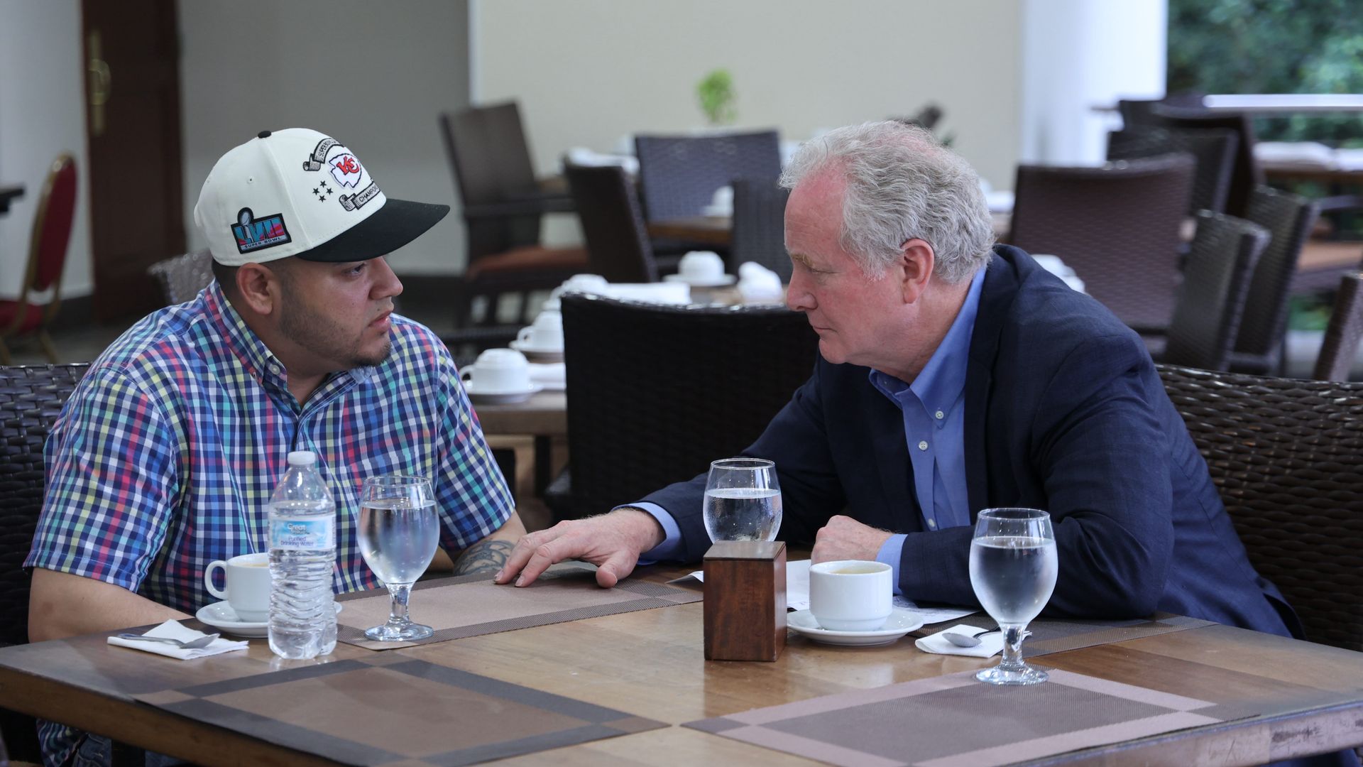 Sen. Chris Van Hollen (D-Md.) meets with Kilmar Armando Abrego Garcia (L) at an undisclosed location on April 17, 2025 in San Salvador, El Salvador. 