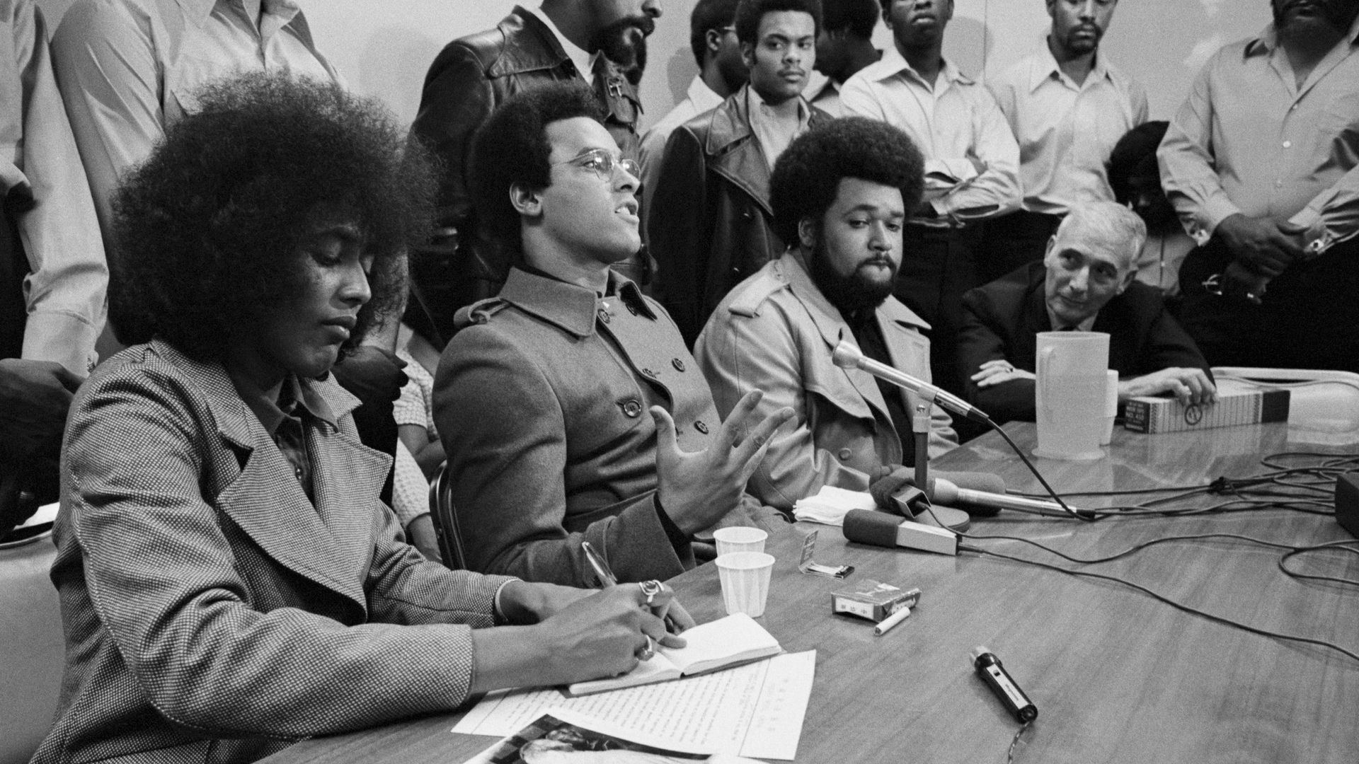Black Panther Party leader Huey P. Newton holds a press conference on his return from China where he met with Chinese leader Zhou Enlai.